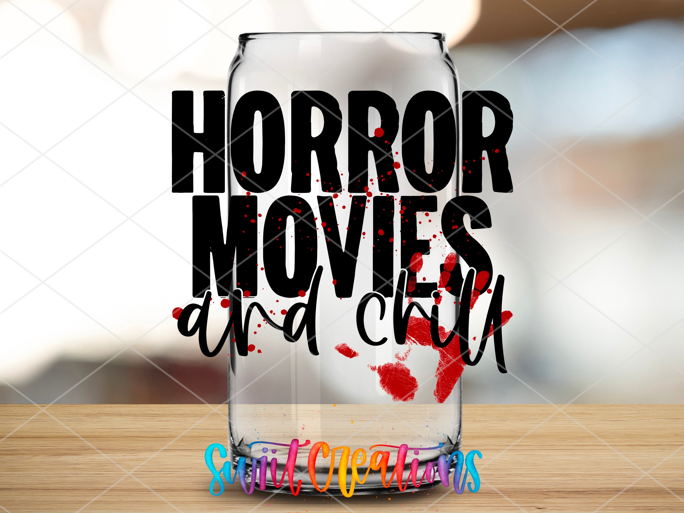 a glass with the words horror movies and chill on it