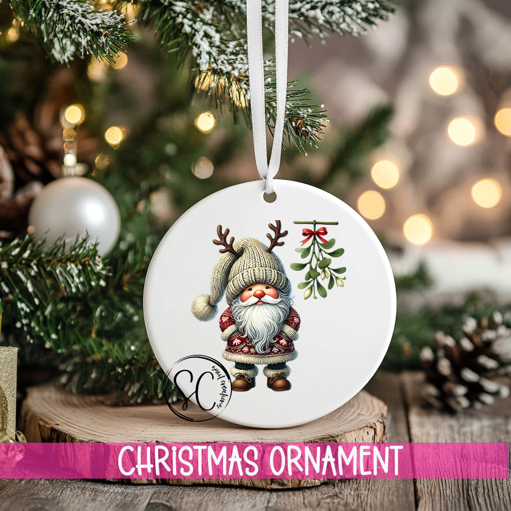 a christmas ornament hanging from a christmas tree