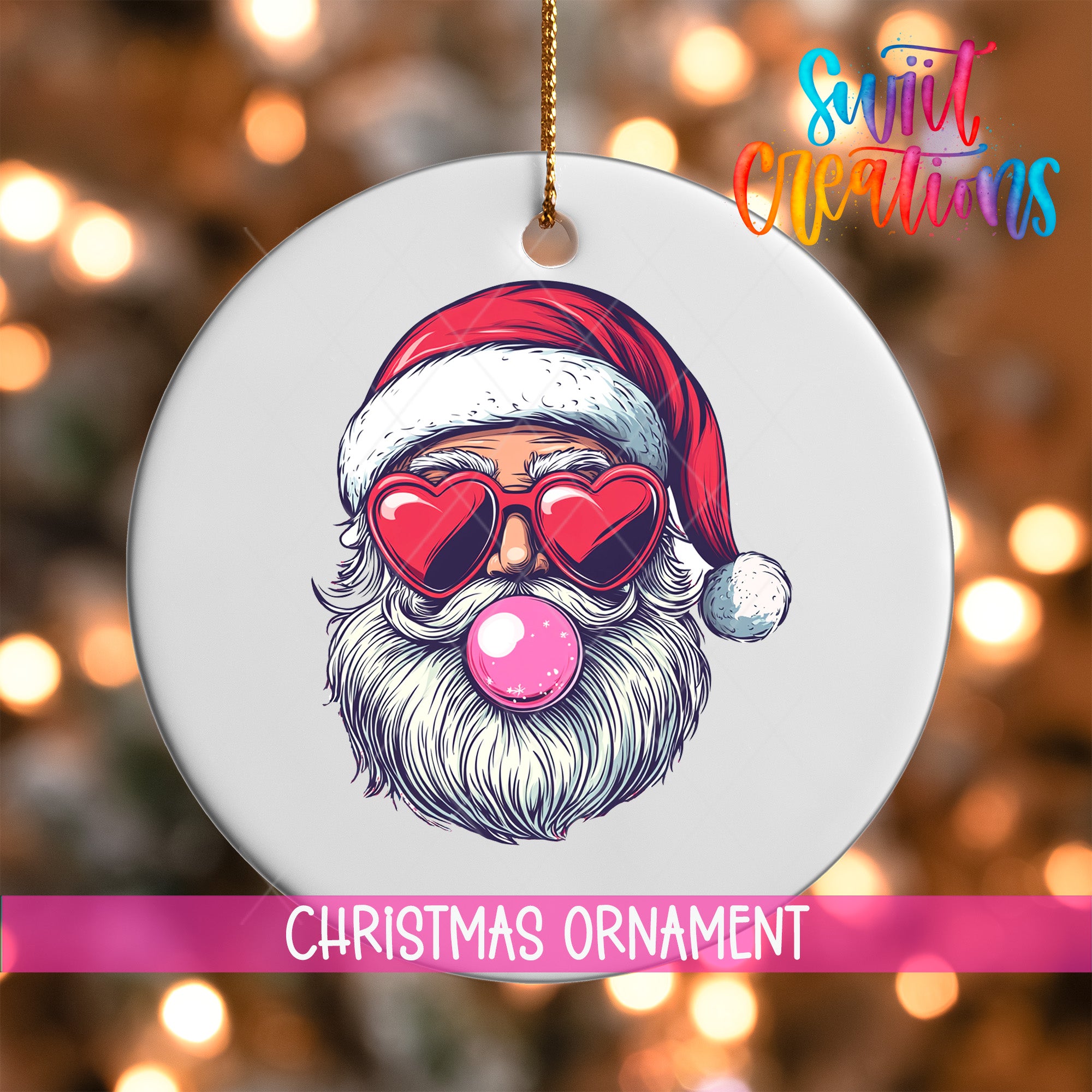 A white Christmas ornament with a Santa Claus face wearing sunglasses and a red hat, with a bubble gum bubble in his mouth.