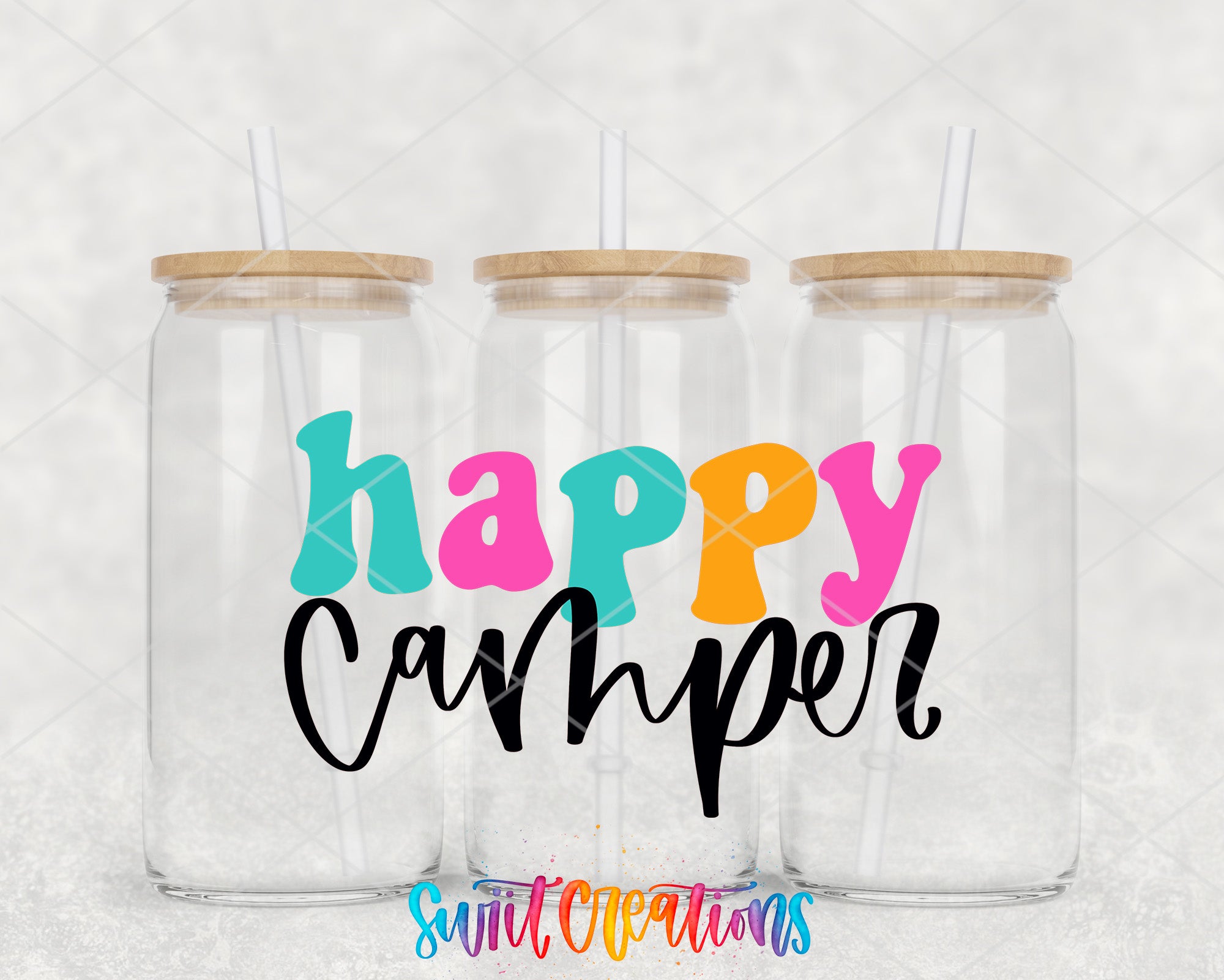 two clear tumblers with the words happy camper printed on them