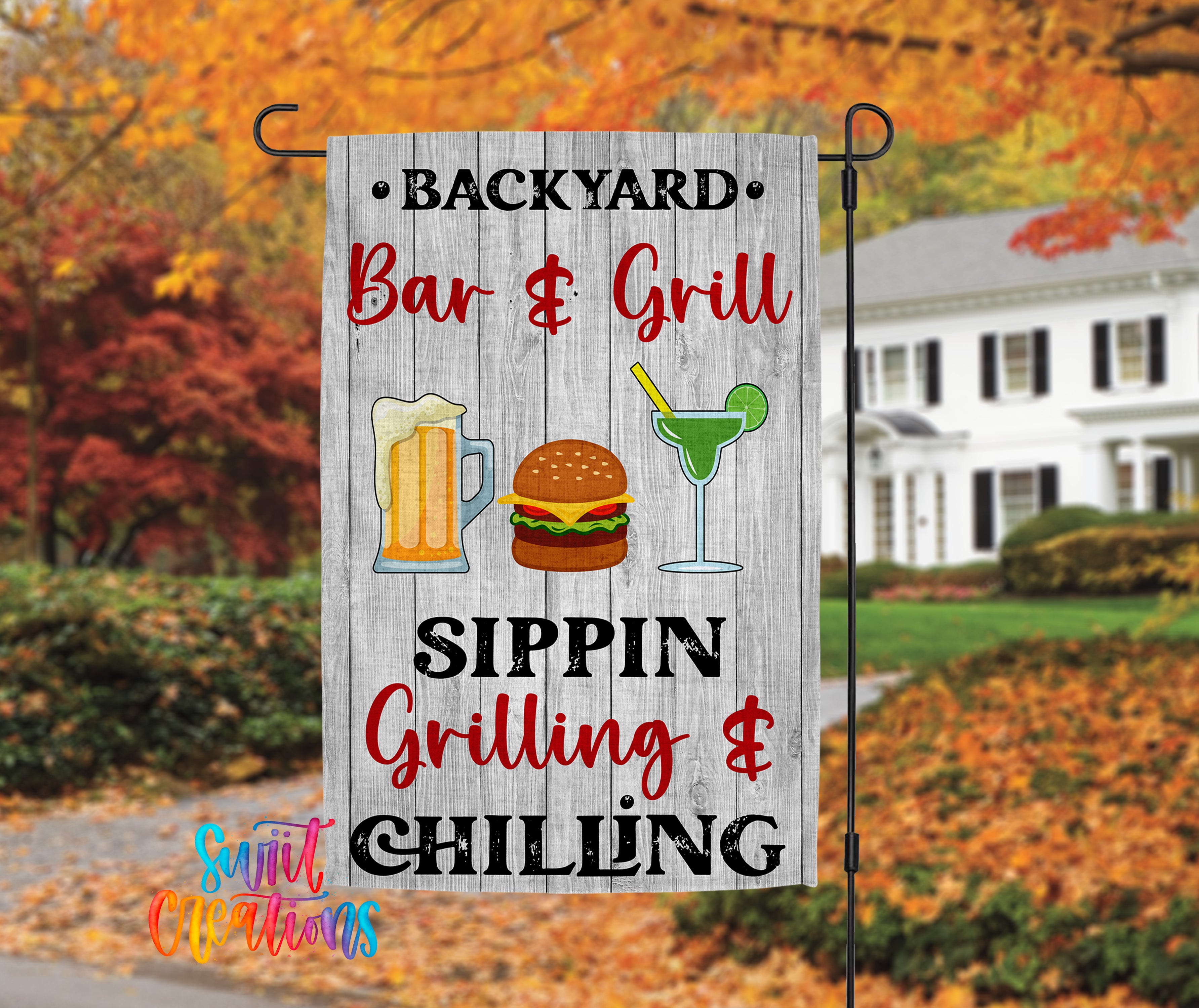A backyard barbecue sign with illustrations of a hamburger, beer mug, and margarita glass, along with the text "Backyard Bar & Grill Sippin Grilling & Chilling".
