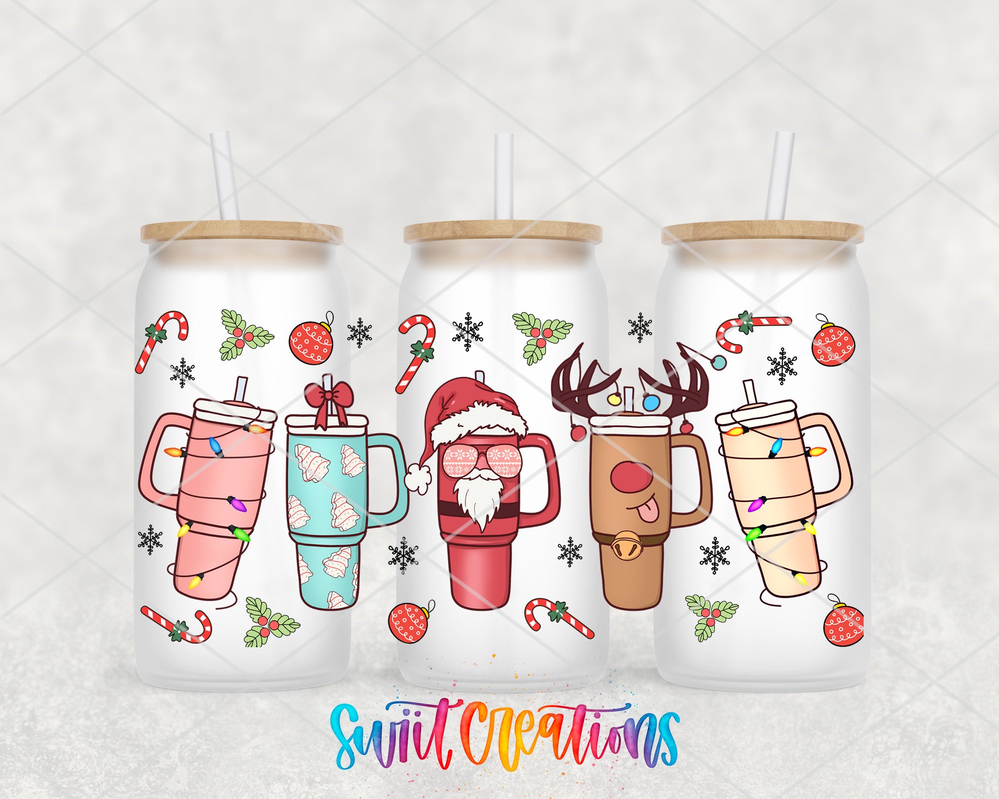 three christmas themed tumblers with santa claus and reindeer