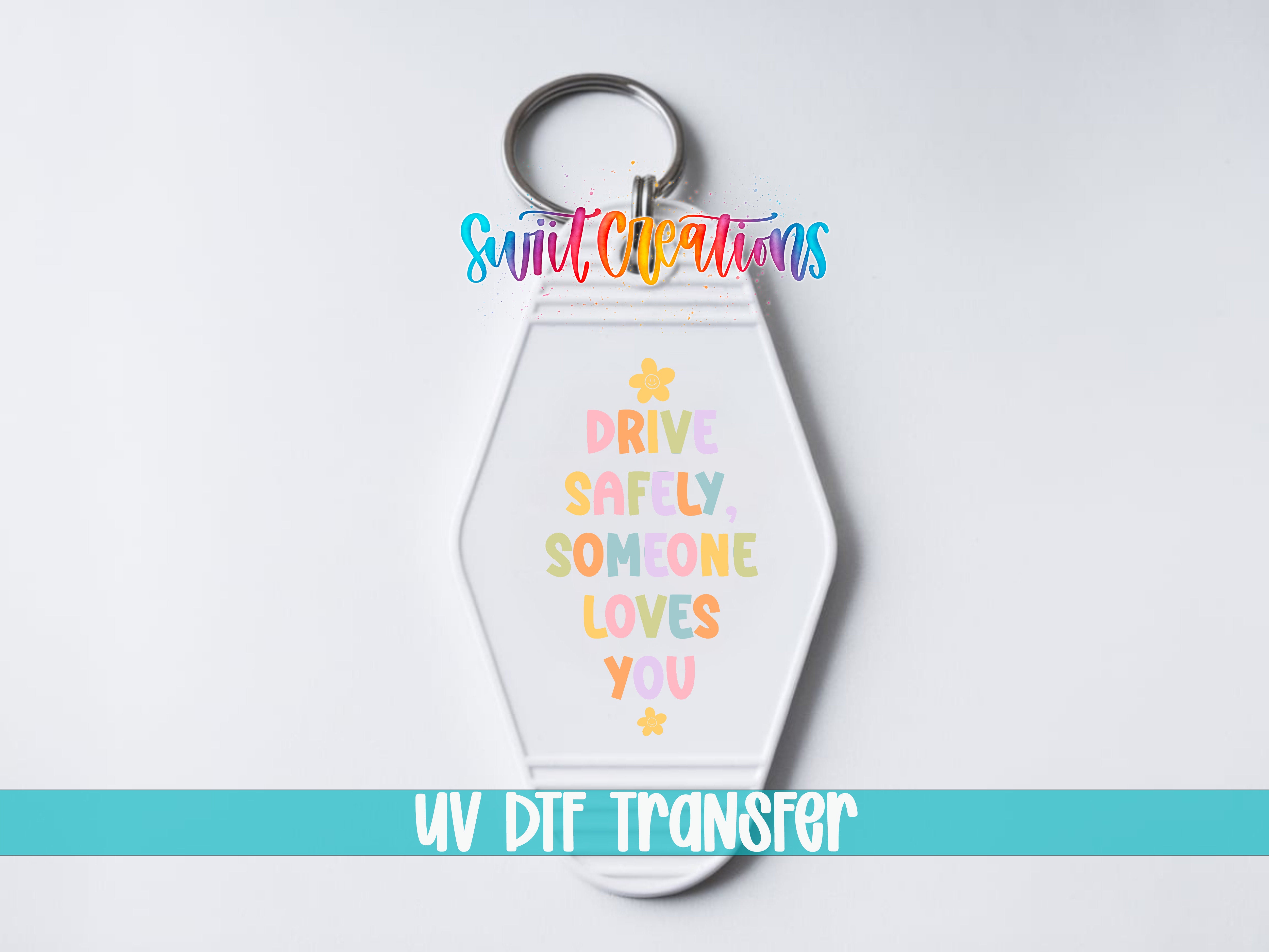 A keychain with a message printed on it, along with a UV transfer logo.