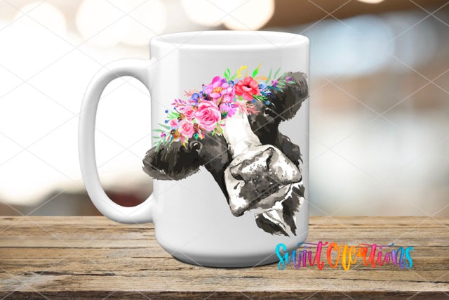 a coffee mug with a cow wearing a flower crown
