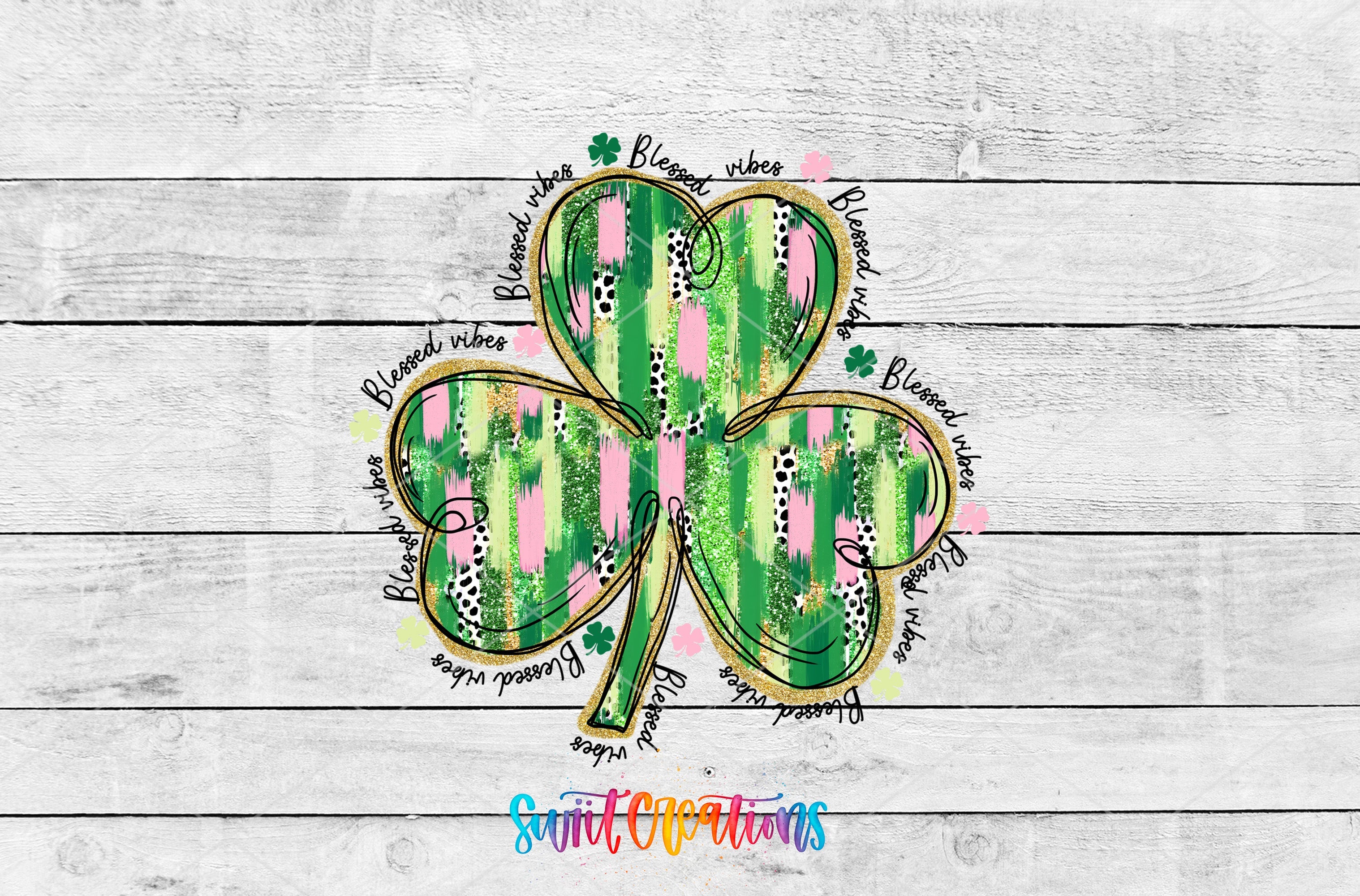 a four leaf clover on a wooden background