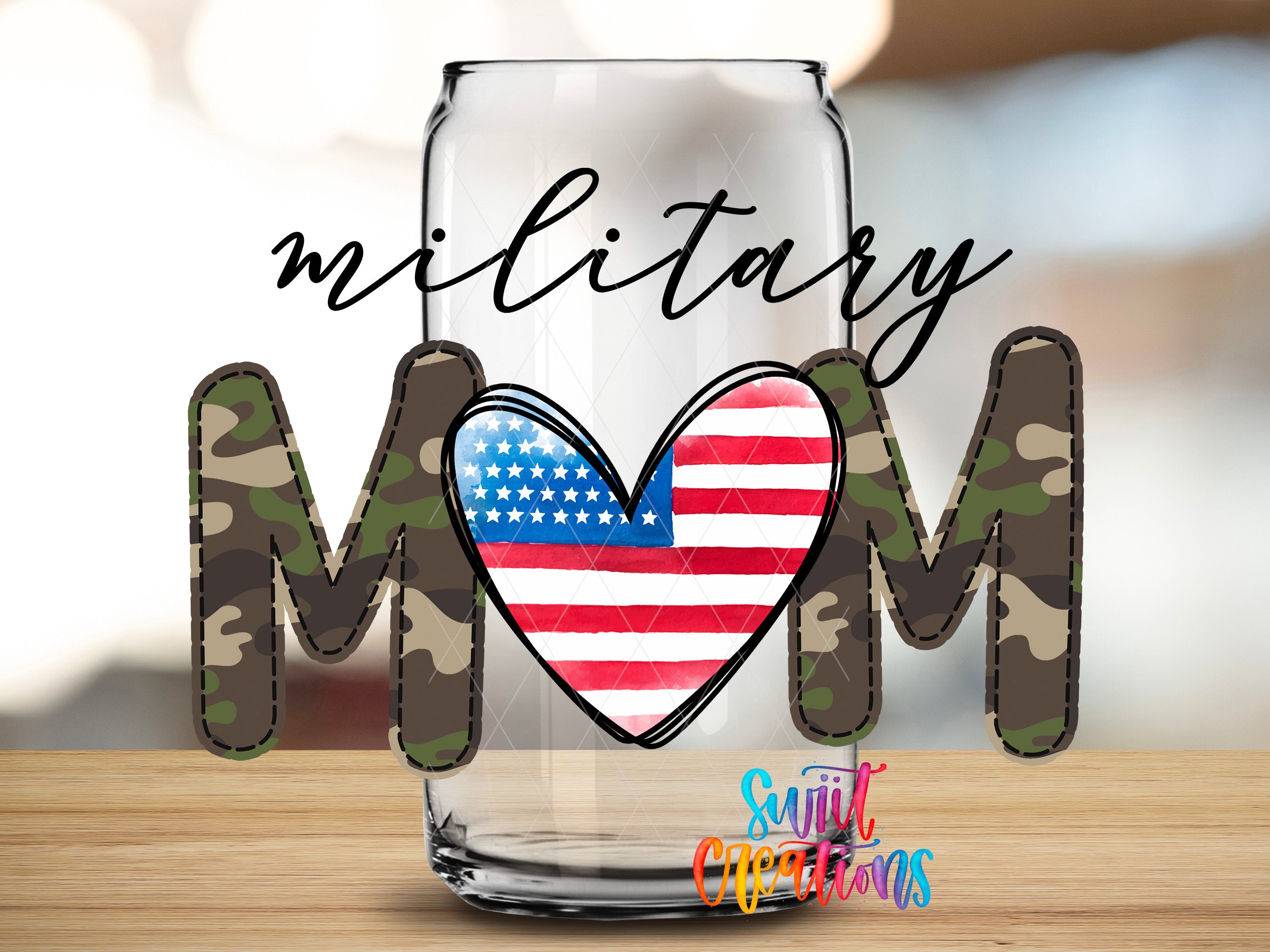 A glass can with the word "MILITARY" written on it, along with a heart-shaped design featuring the American flag inside it.