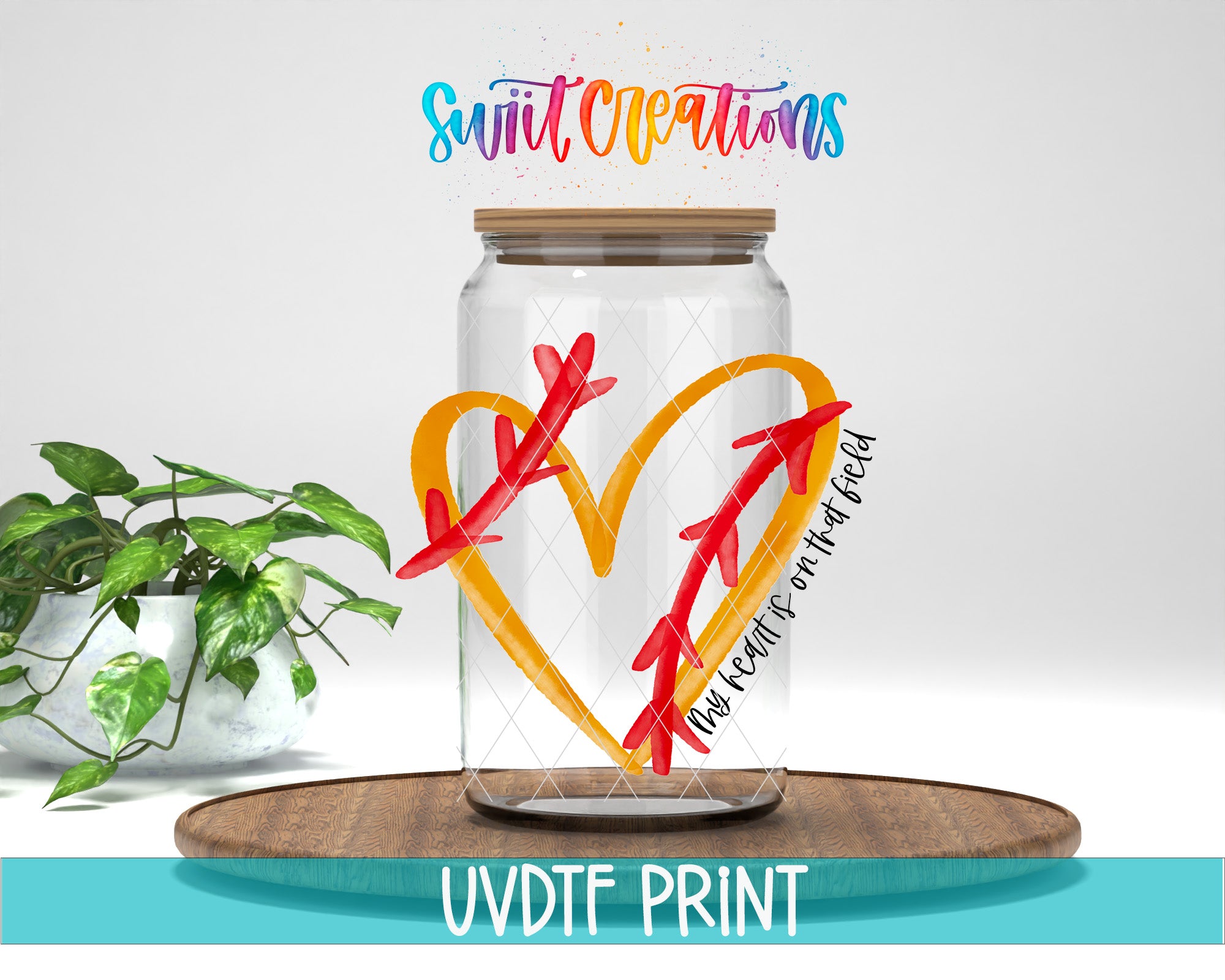 a glass jar with a heart painted on it