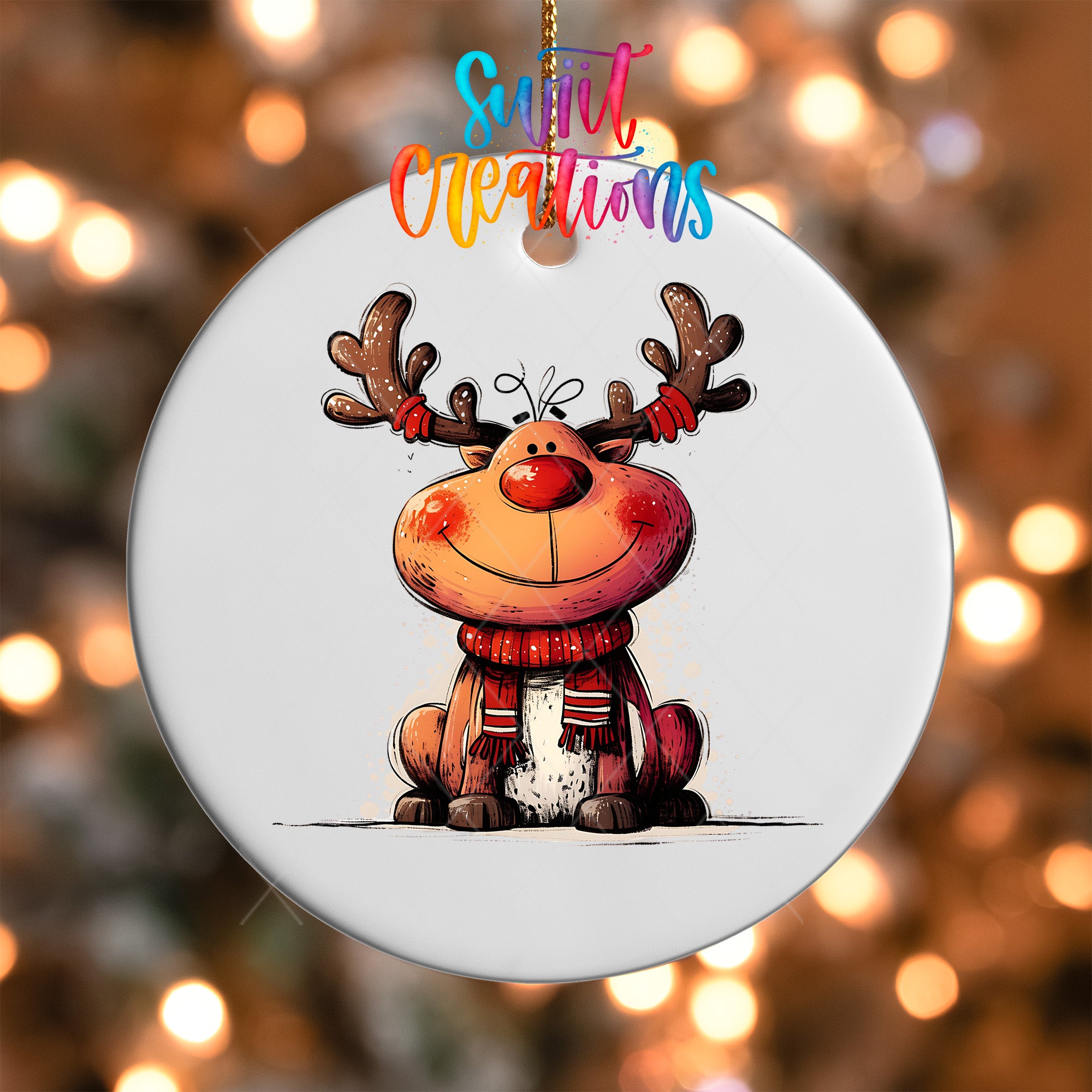 A white ornament with a cartoon reindeer wearing a red scarf and antlers, with the text "Sweet Creations" written above it.