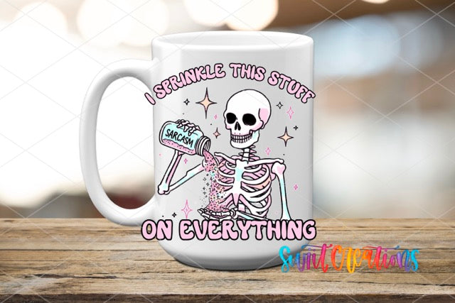 a white coffee mug with a skeleton holding a hair dryer