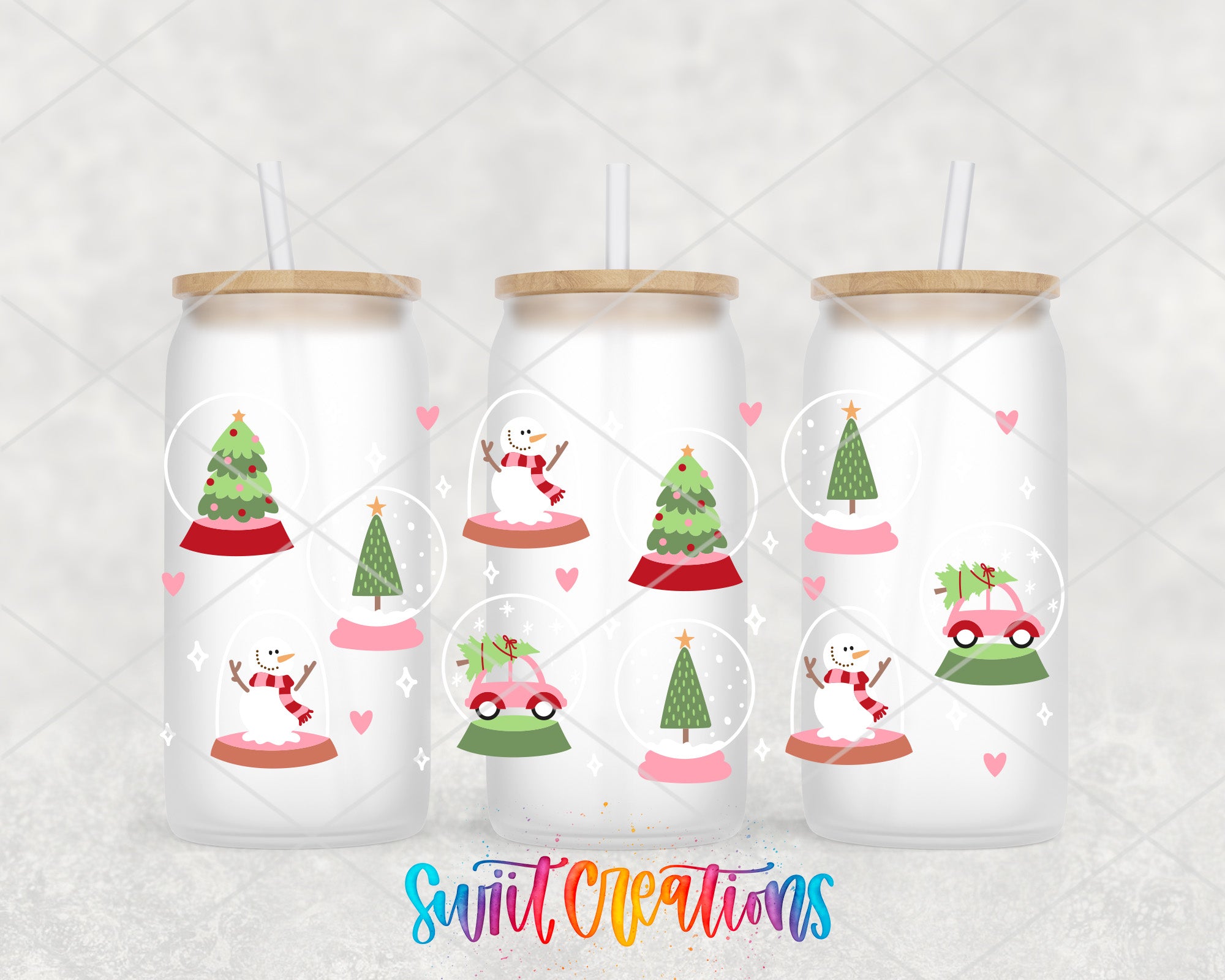 three christmas themed tumblers with a snowman and a christmas tree