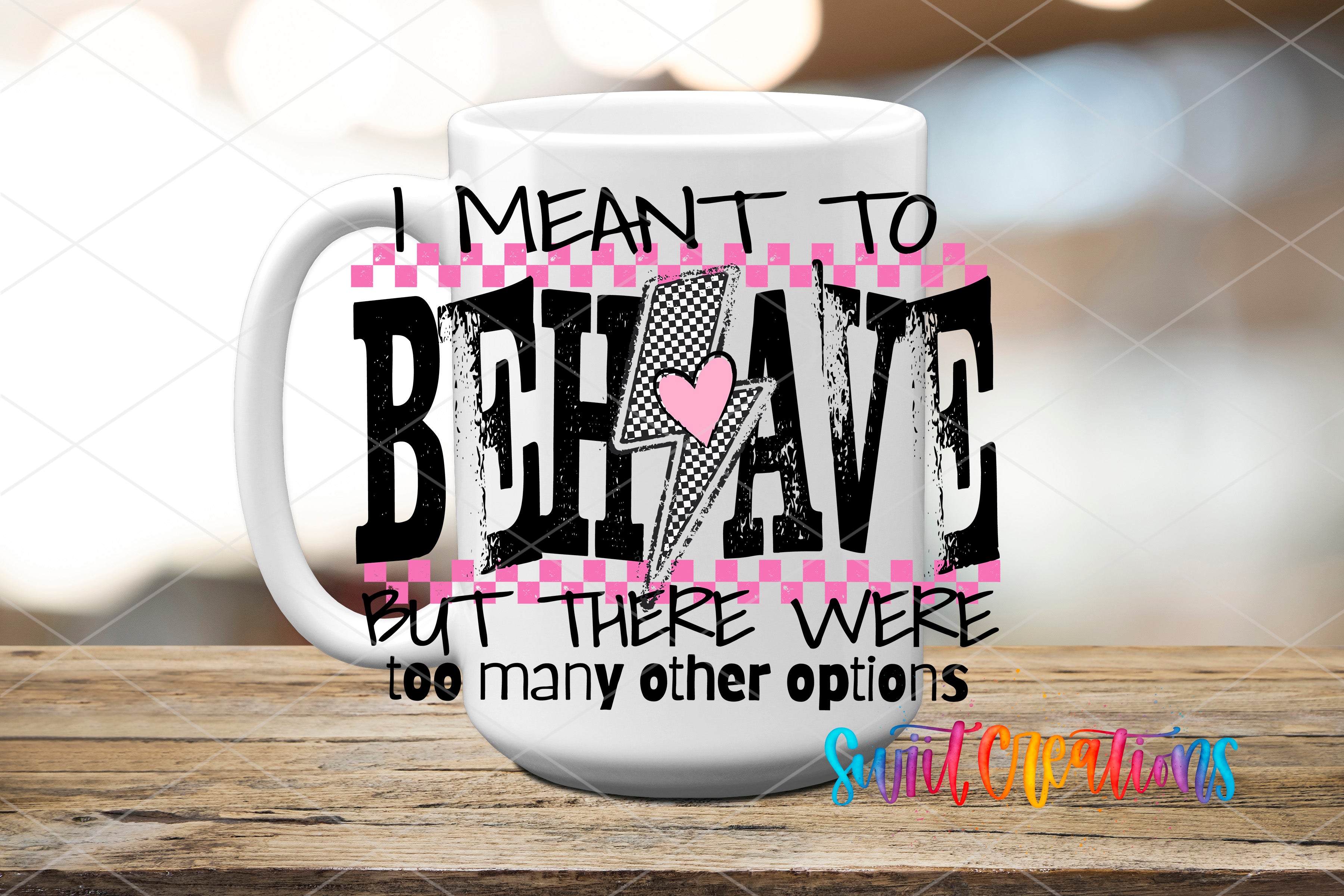 A white mug with a printed text design on it, placed on a wooden surface.