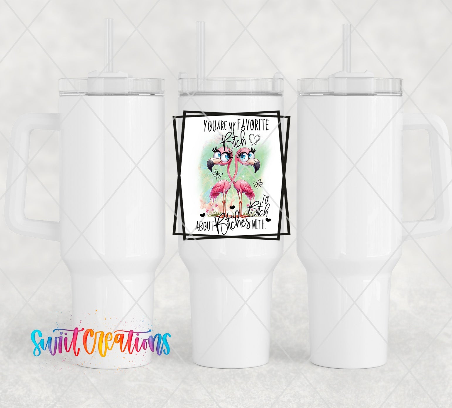 a couple of white coffee cups sitting next to each other