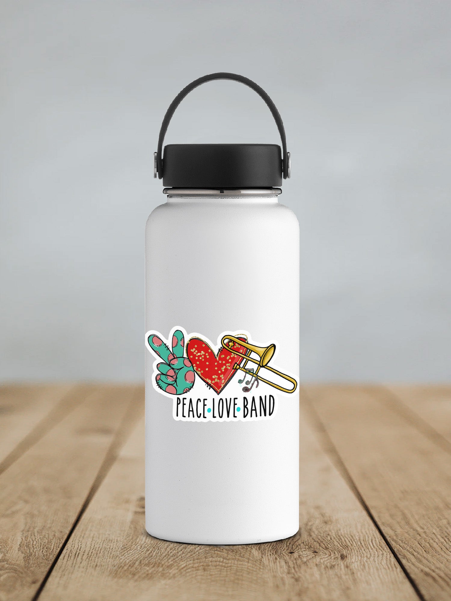 a white water bottle sitting on top of a wooden table