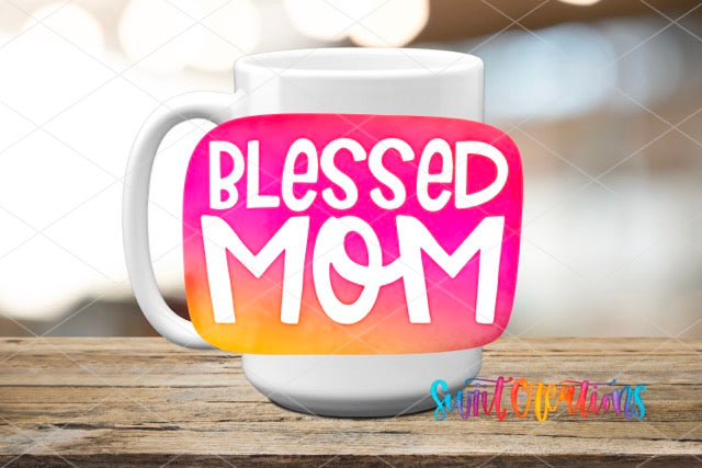 a coffee mug with the words, blessed mom on it