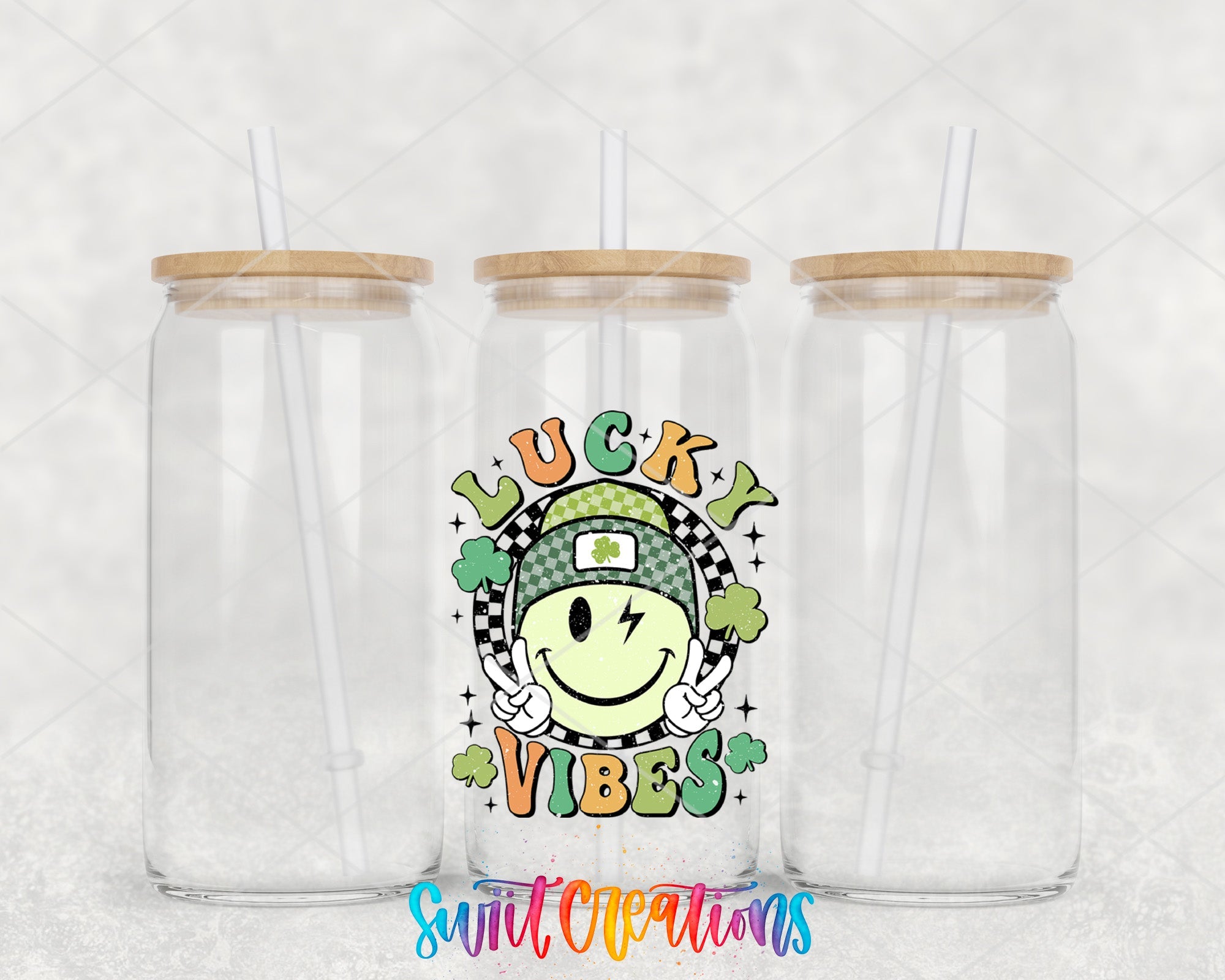 two clear tumblers with a smiley face on them