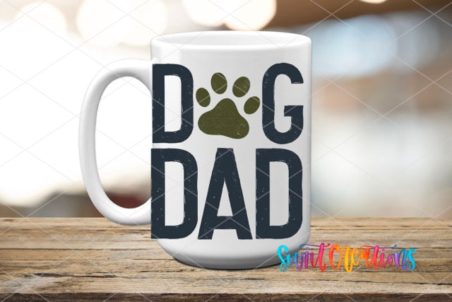 a coffee mug with the words dog dad printed on it