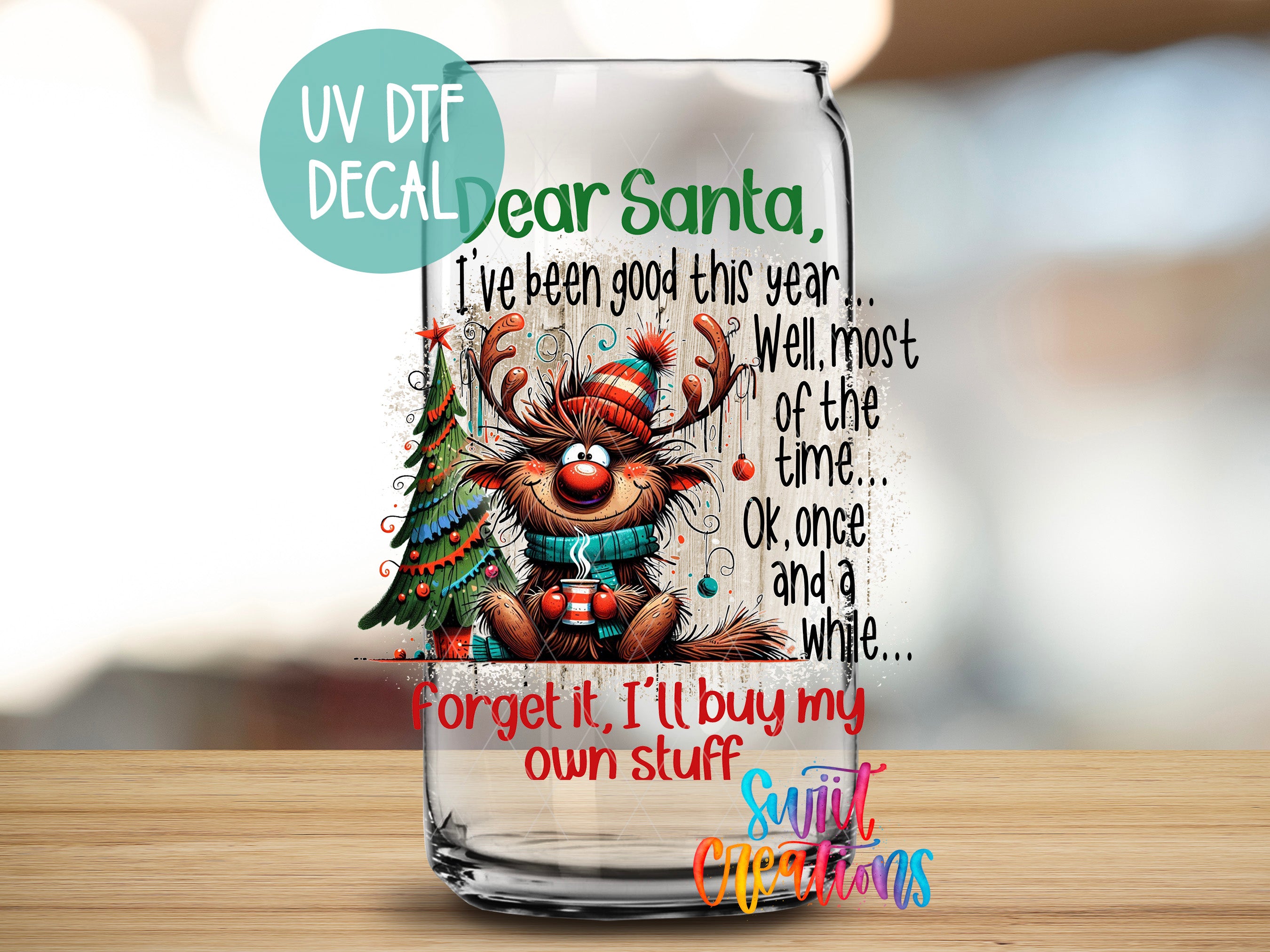 a glass with a picture of a reindeer on it