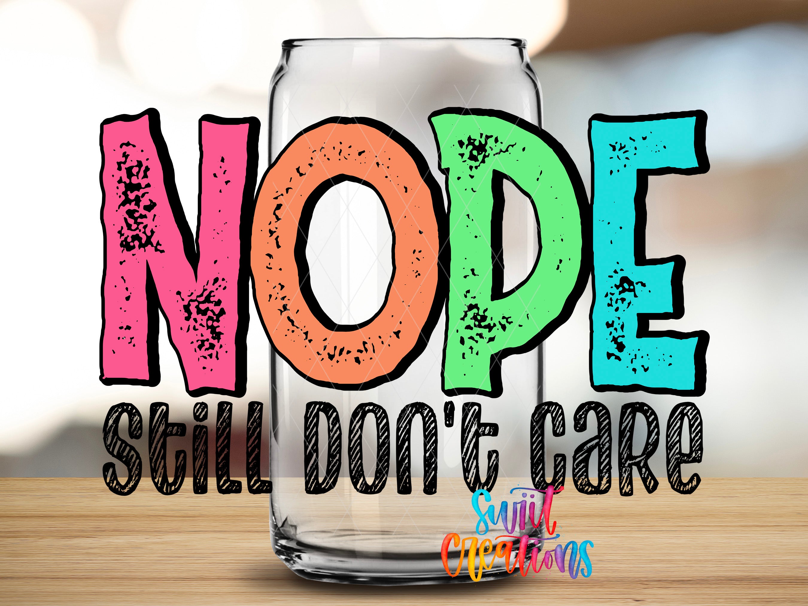 a colorful text overlay on a glass can, which reads "NOPE STILL DON'T CARE" in a playful and humorous manner.