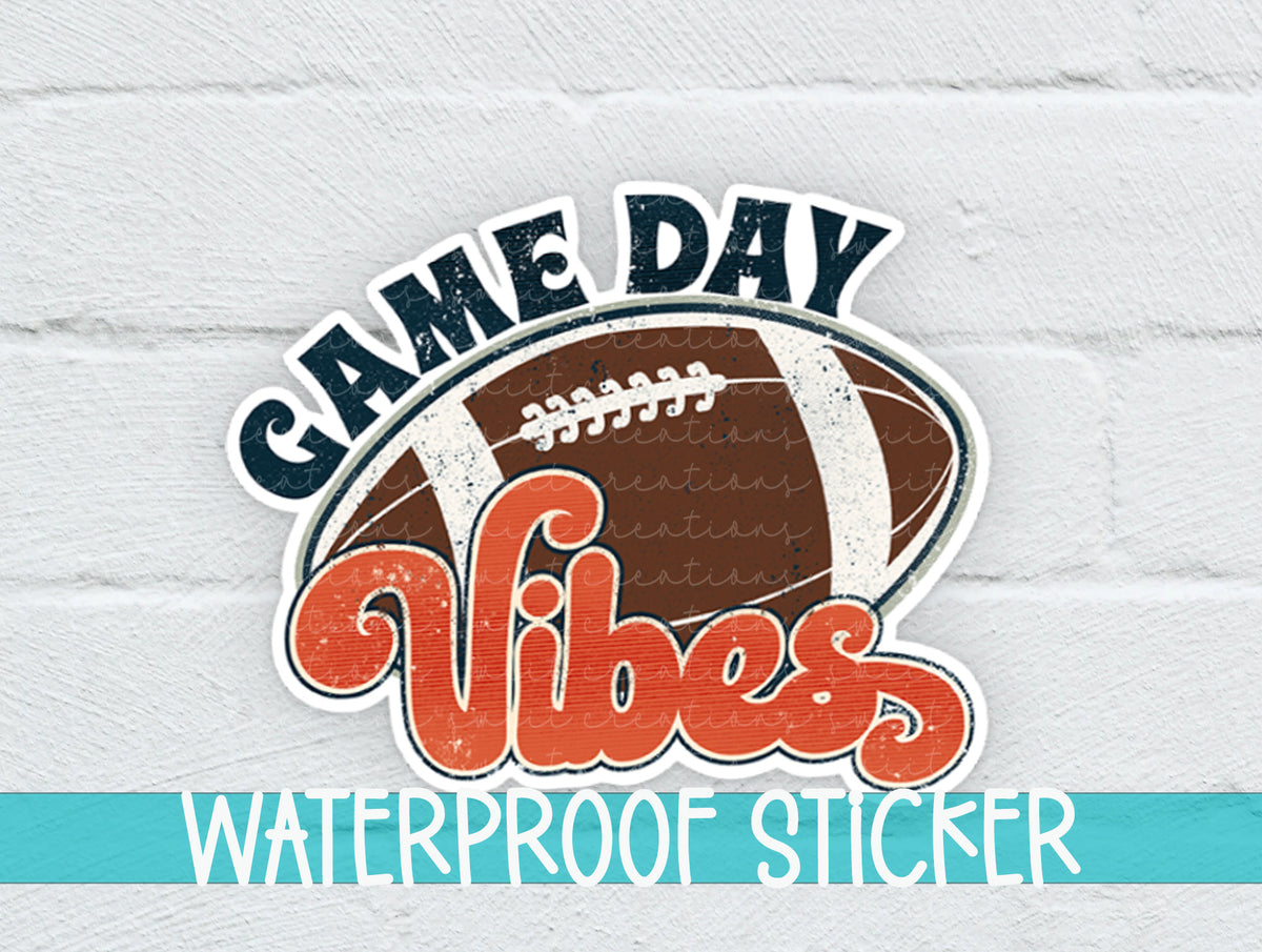 Football Game Day Vibes sticker on a white brick background with a waterproof sticker banner