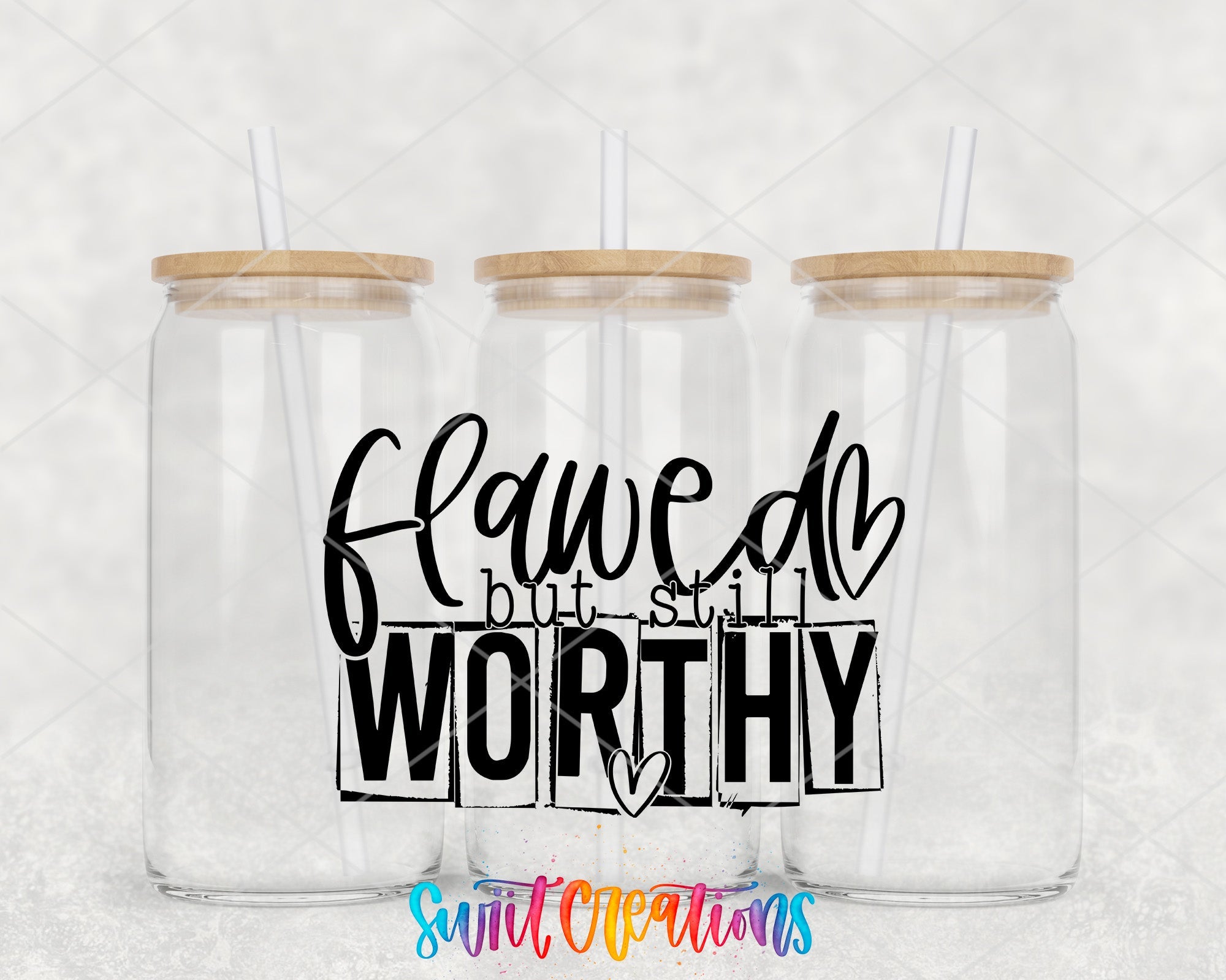 a couple of glass jars sitting on top of a table