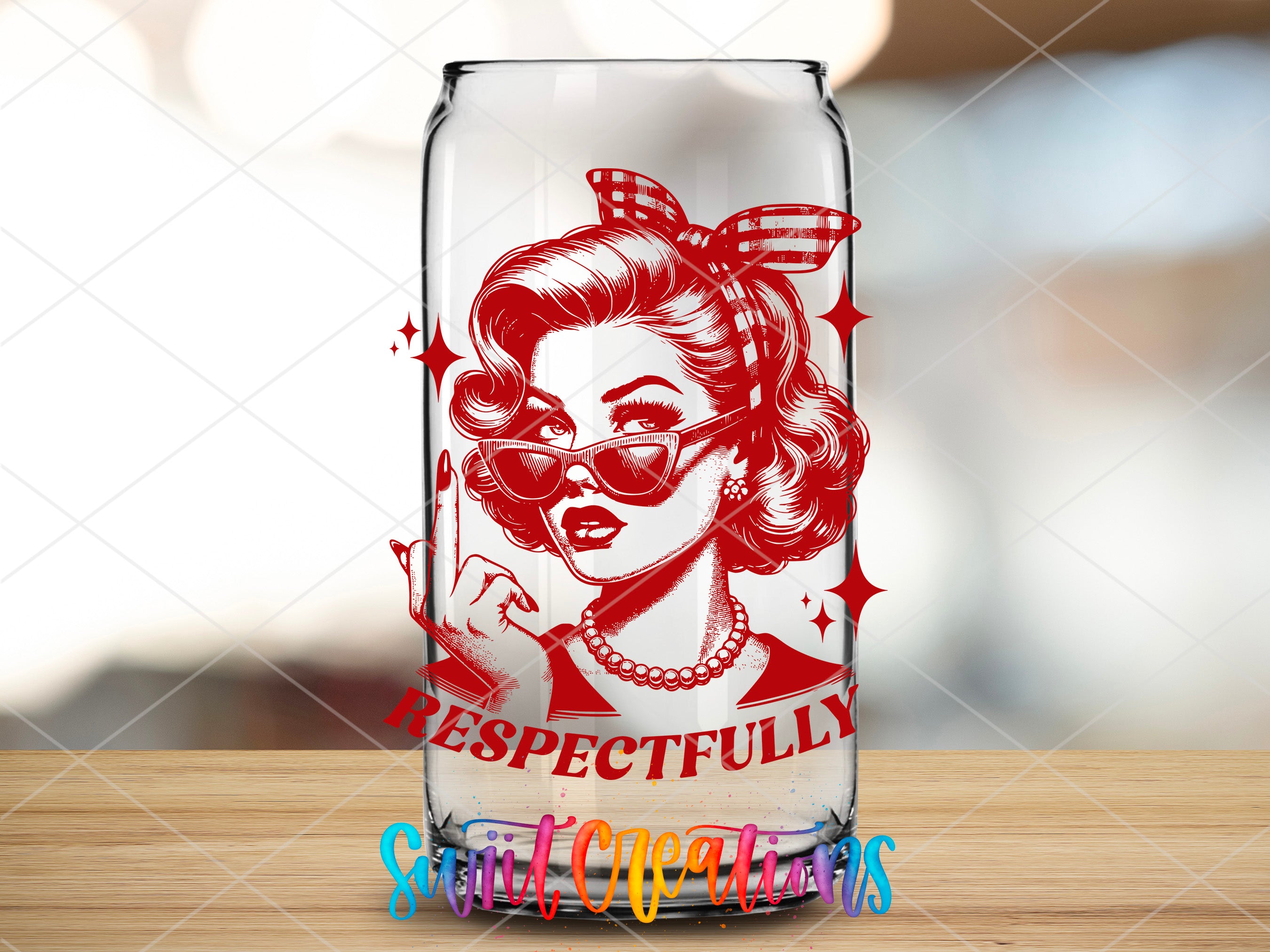 a glass with a picture of a woman in a mask on it