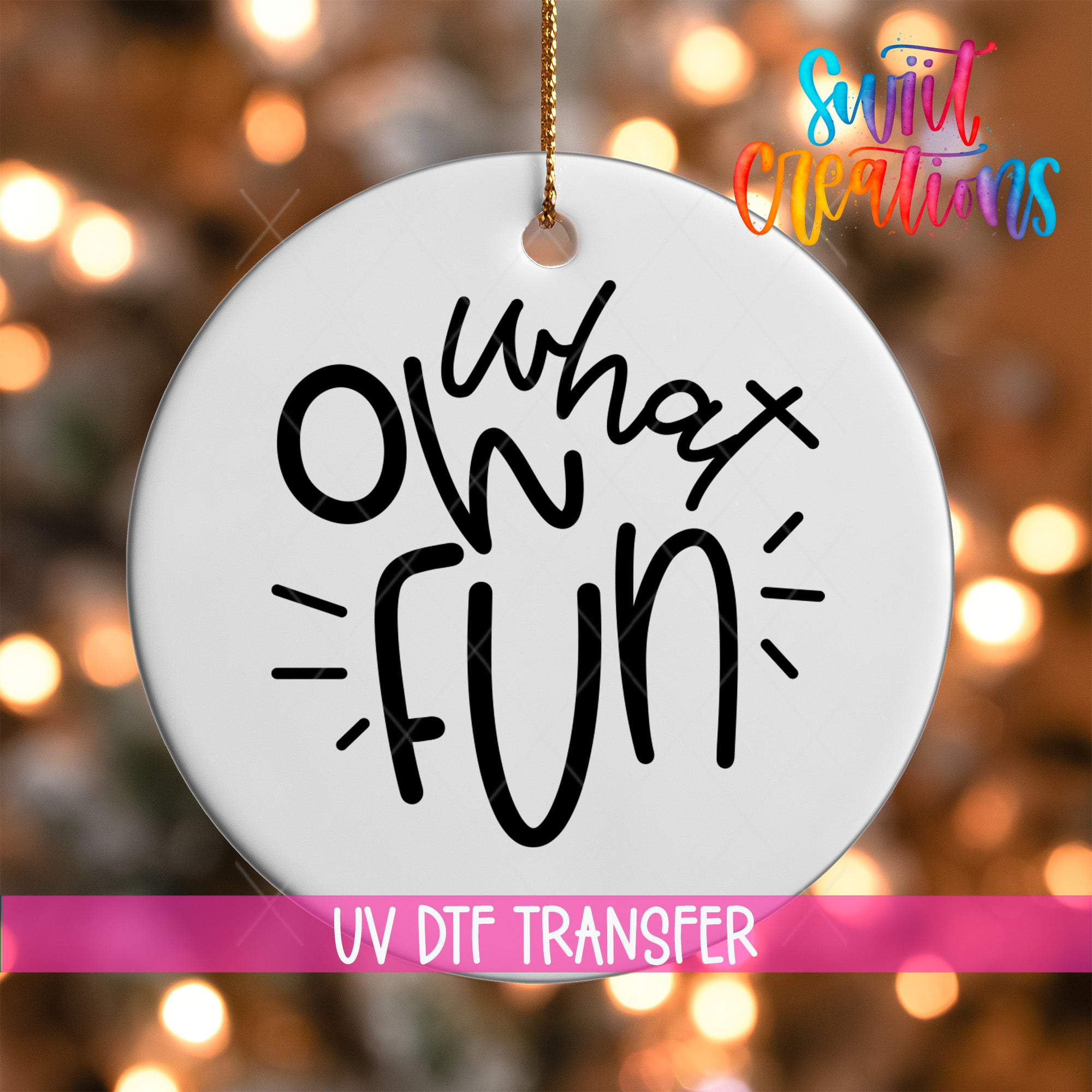 A white circular ornament with the text "What's fun" written on it, hanging against a background of colorful lights.