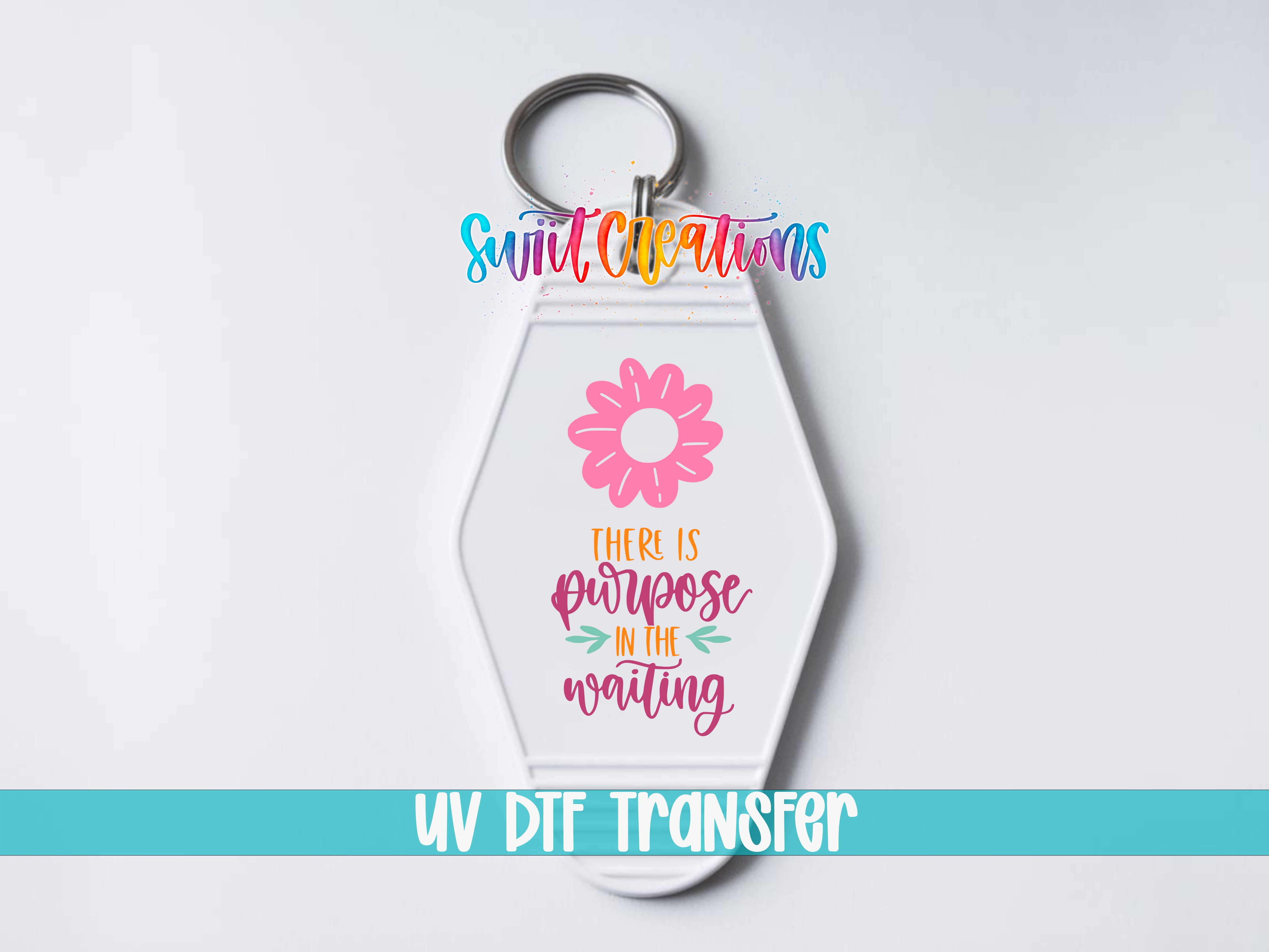 A keychain with a flower design and text that says "There is purpose in the waiting" in a colorful, stylized font.