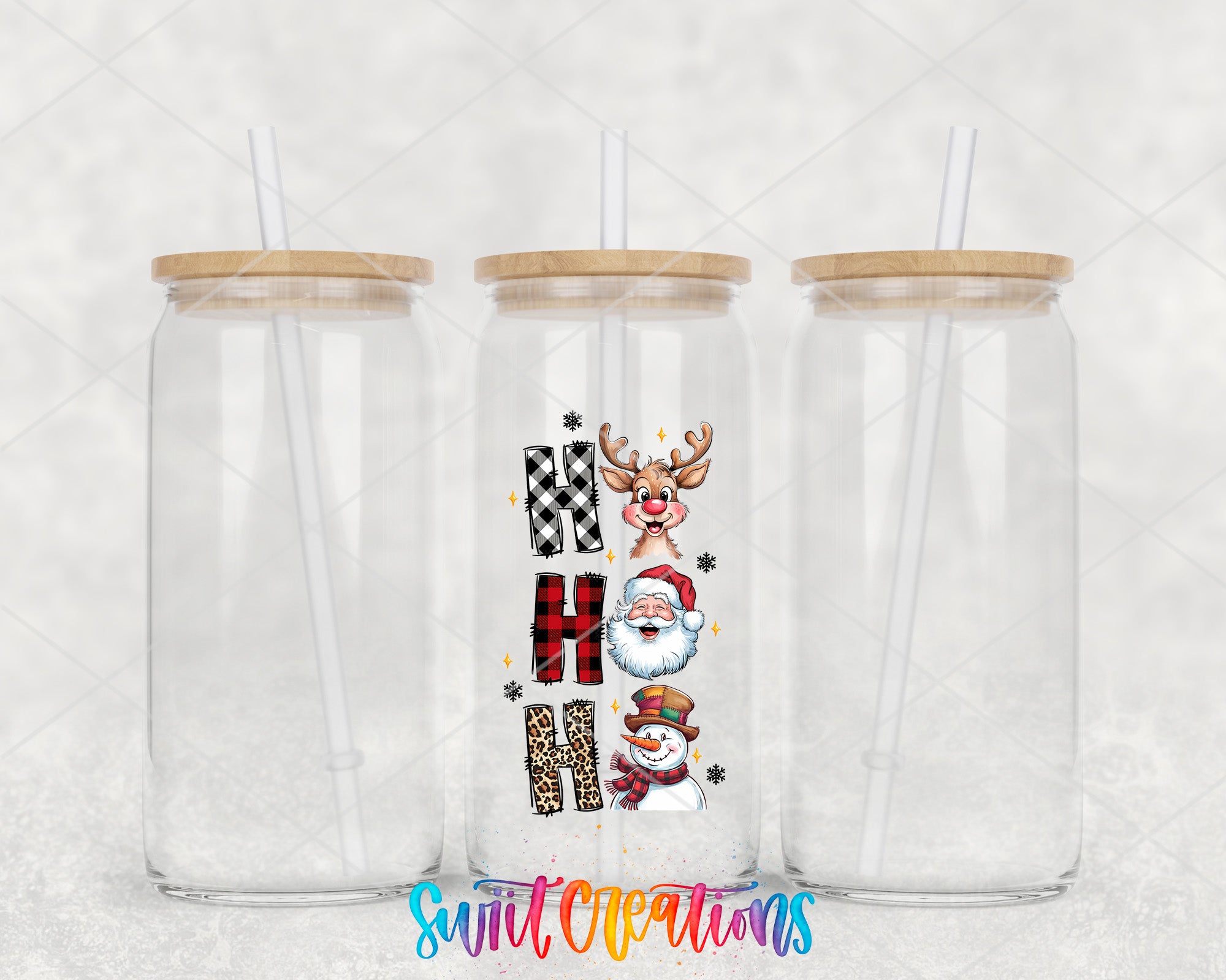 two clear tumblers with santa claus and snowmen on them