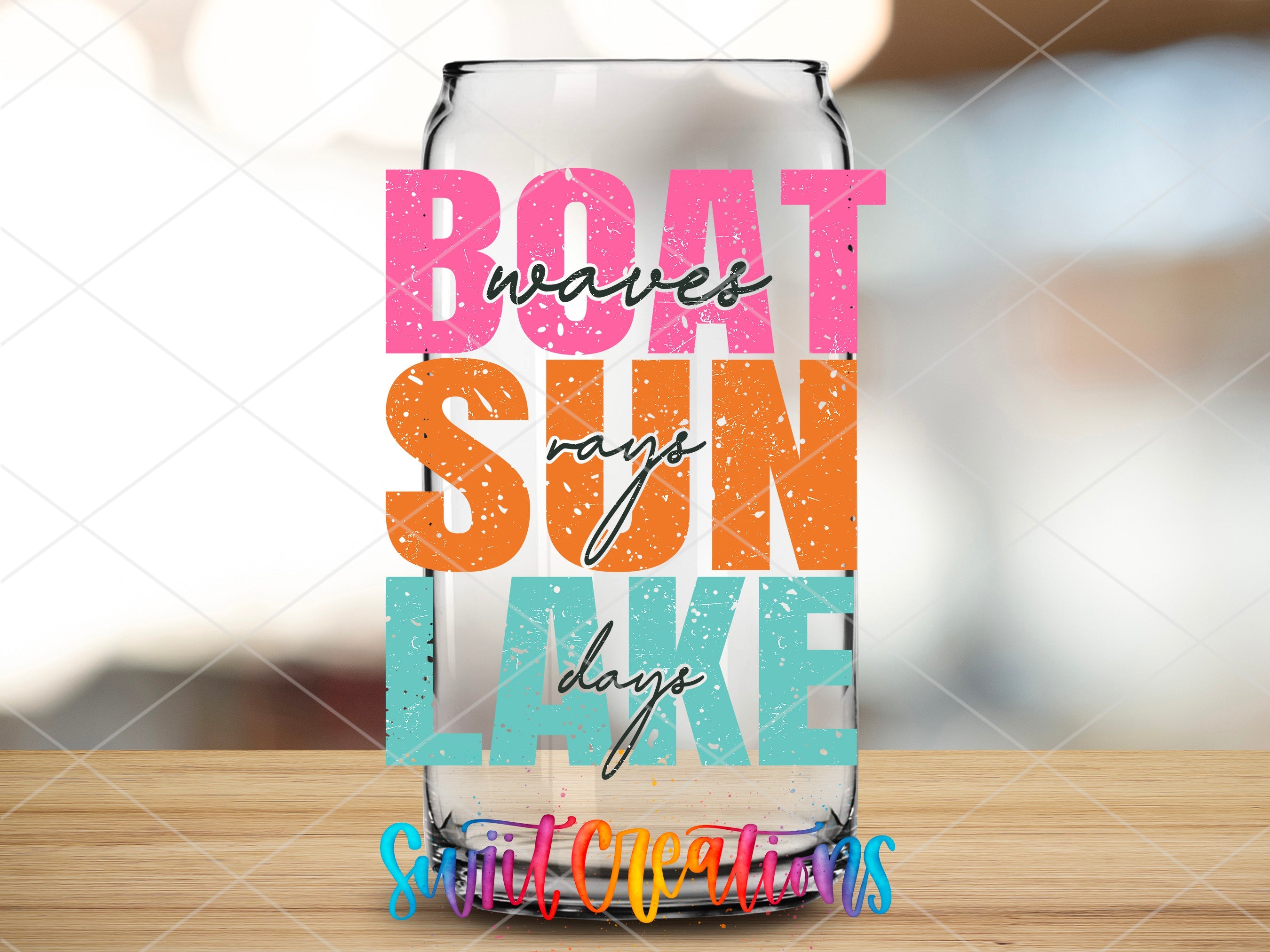 a beer glass with the words boat, sun, and lake on it