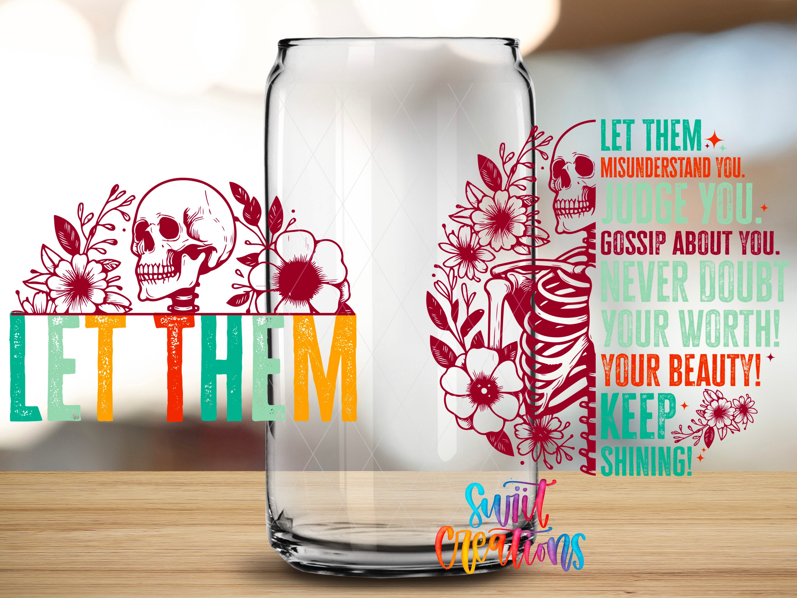 a glass can with a colorful, floral design and text printed on it.