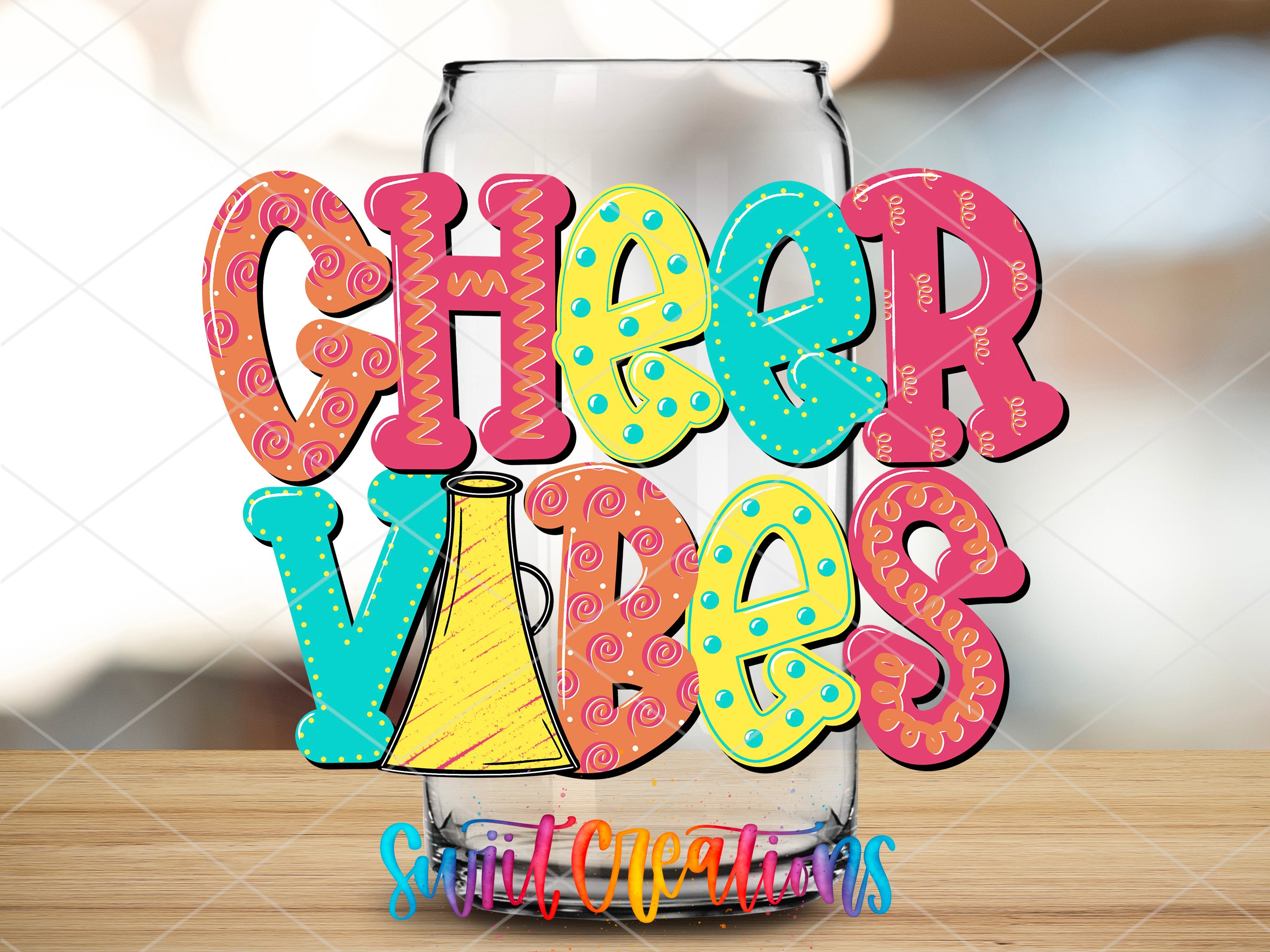 a glass with the word cheer vibes on it