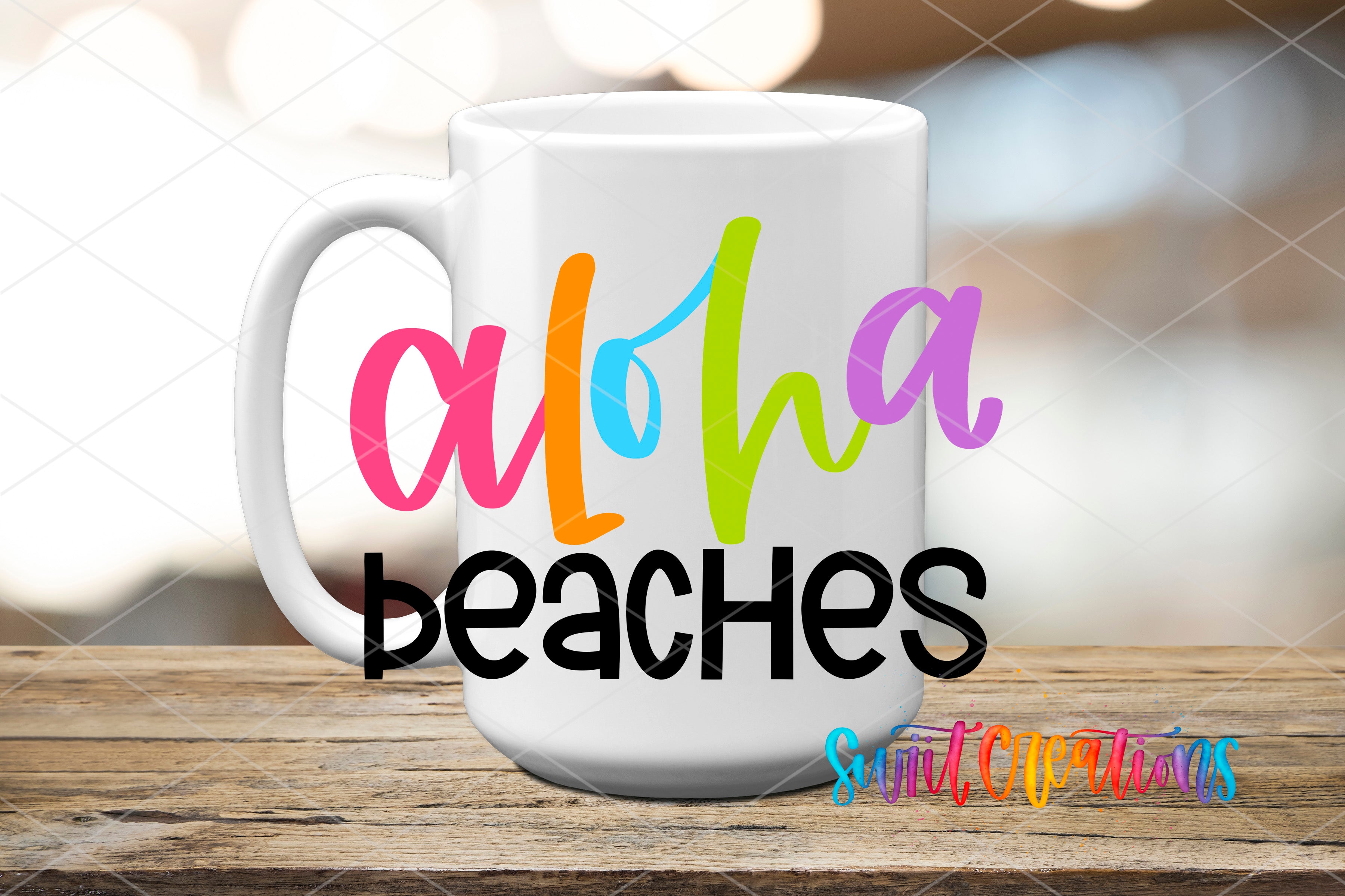 A white mug with the text "Aloha beaches" printed on it, placed on a wooden surface.
