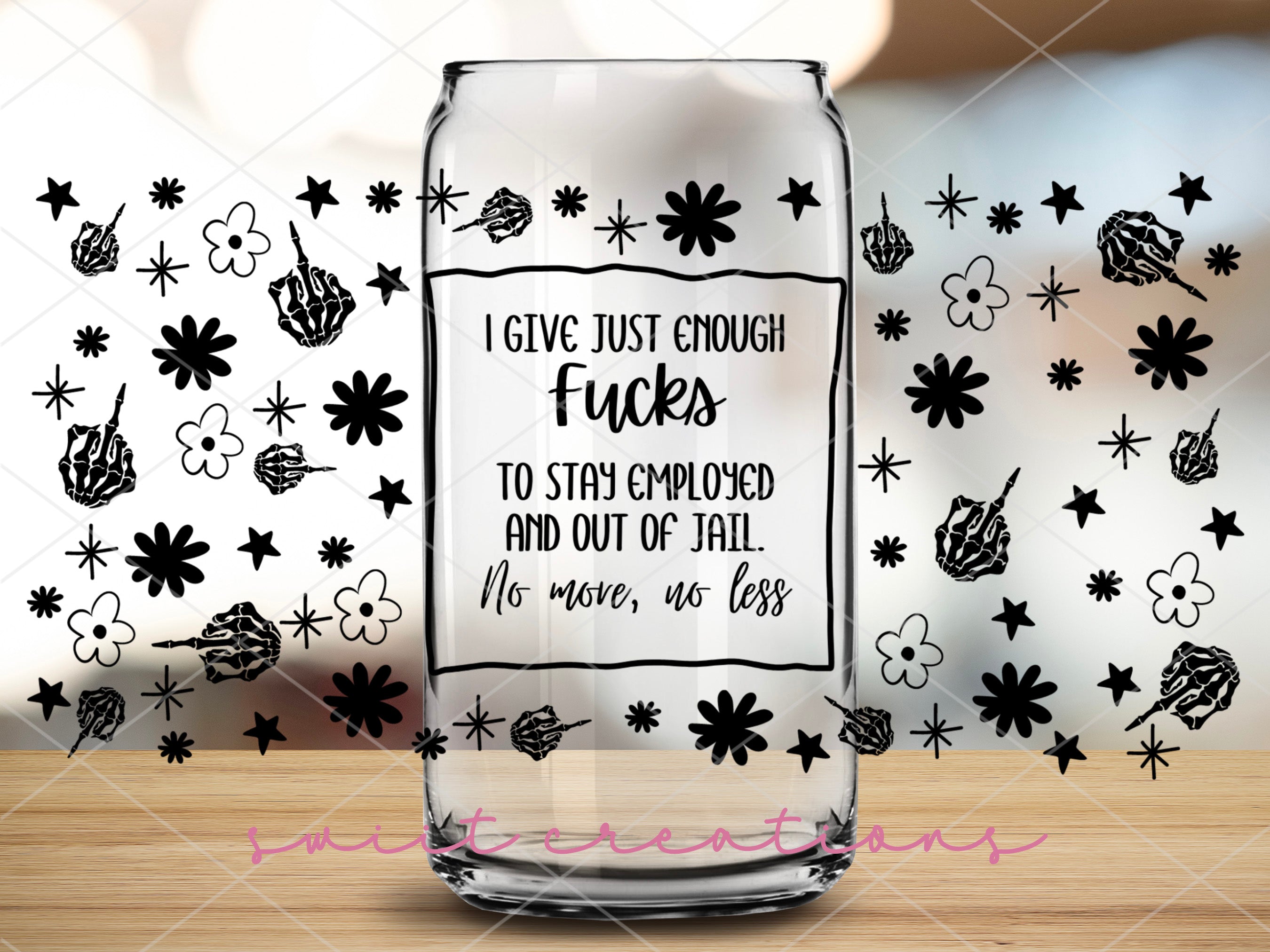 a glass jar with a quote on it sitting on a table