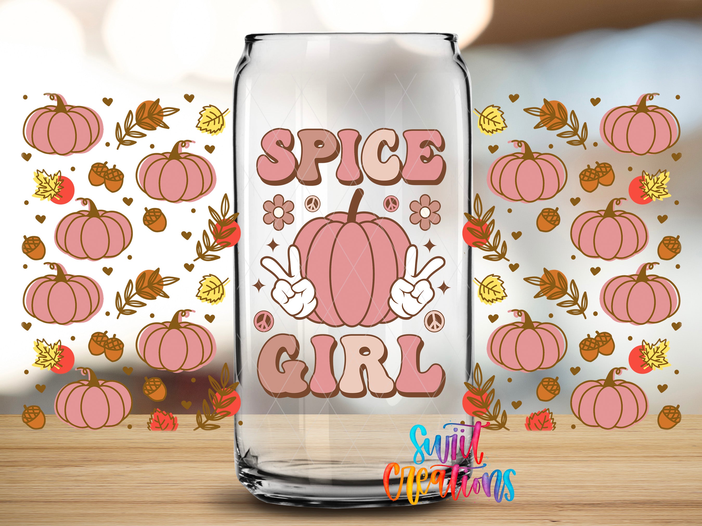 a glass can with a design that includes a pumpkin and the text "SPICE GIRL" surrounded by autumn-themed elements such as leaves, acorns, and pumpkins.