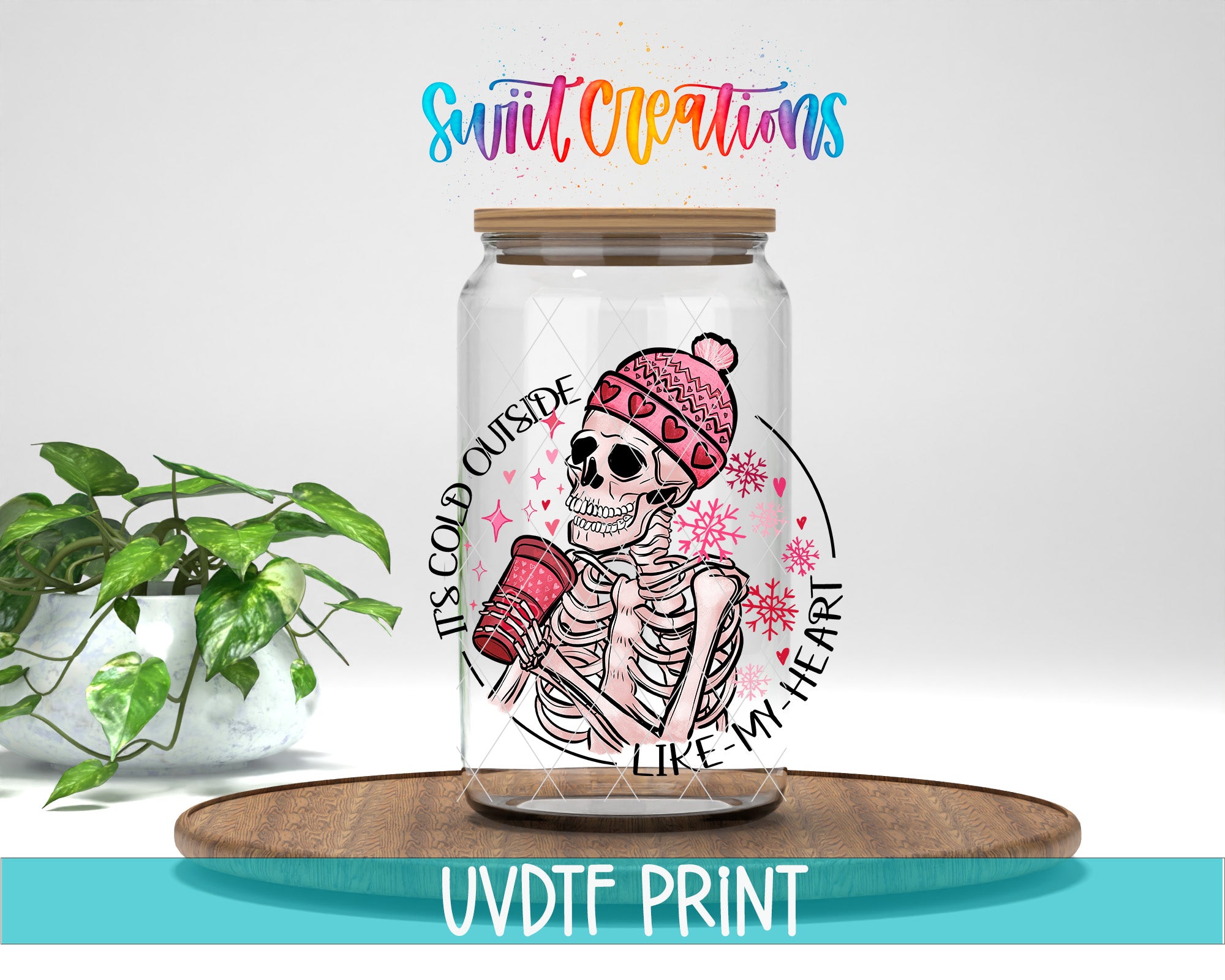 a glass jar with a skeleton inside of it