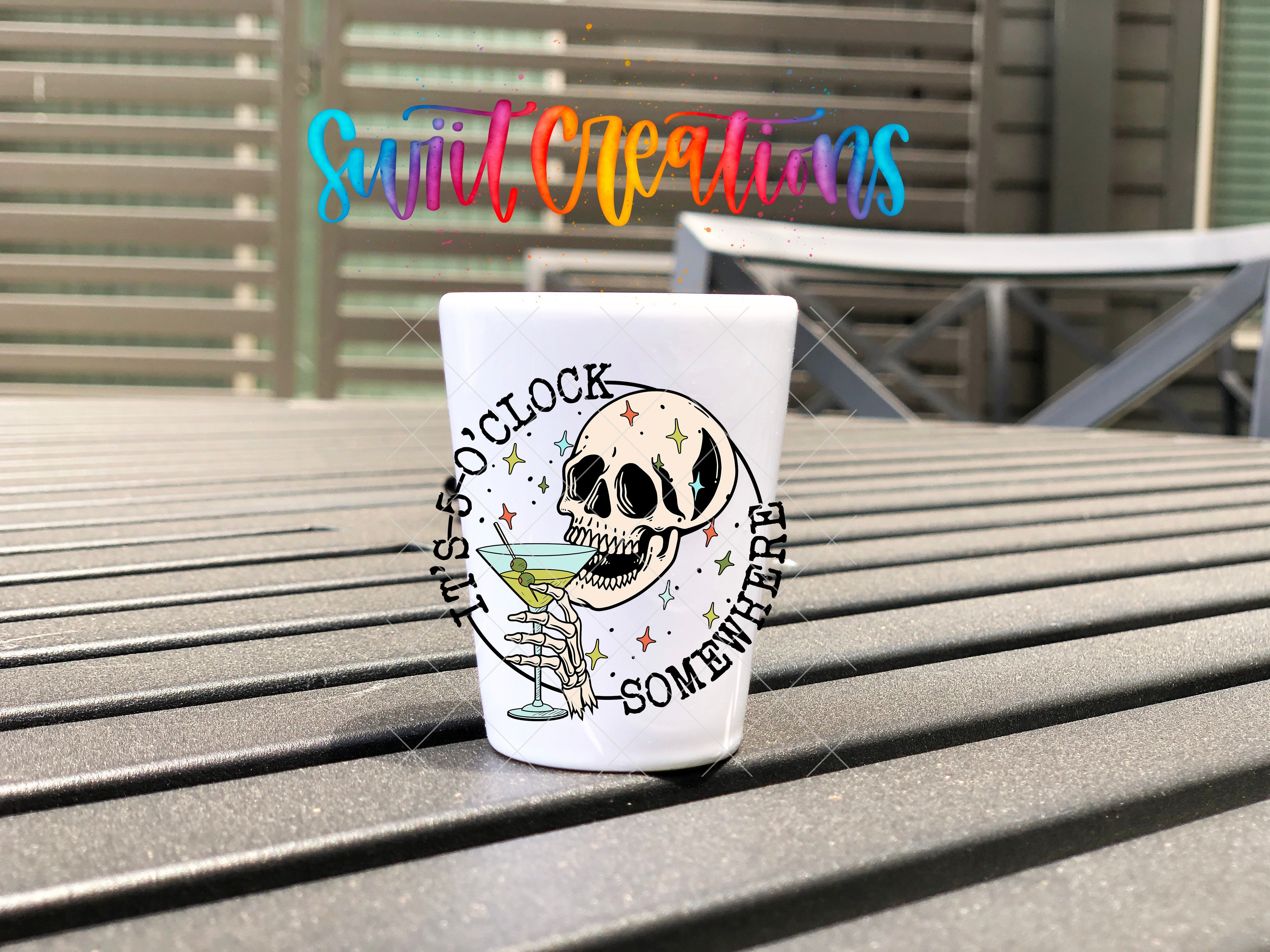 a coffee cup sitting on top of a wooden table
