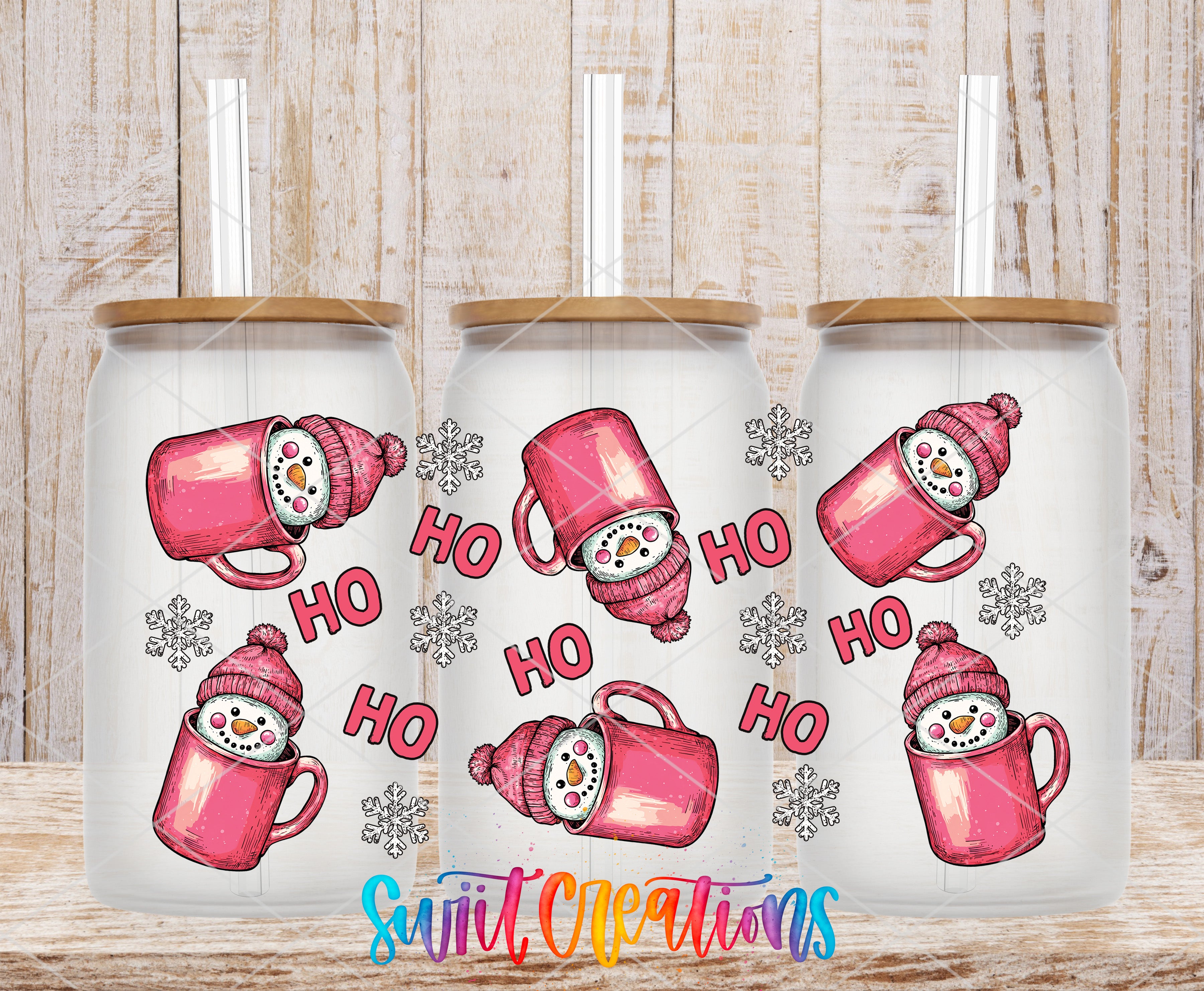 three white mugs with pink snowmen and snowflakes on them, along with the text "HO HO HO" written in pink.