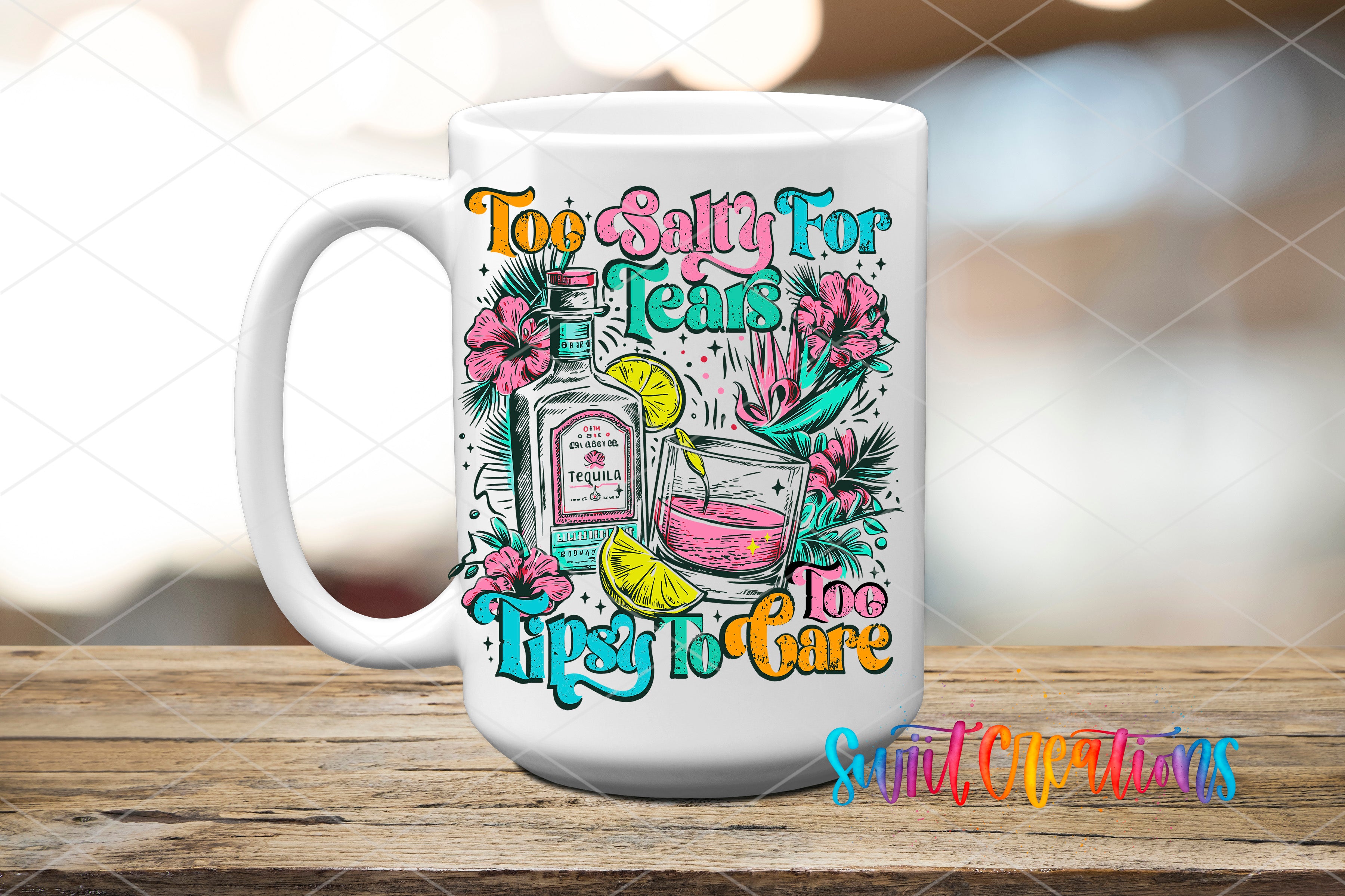 A white mug with a colorful graphic design featuring a tequila bottle, a tequila glass, and various tropical flowers and leaves. The text on the mug reads "Too salty for tequila, tipsy to care".