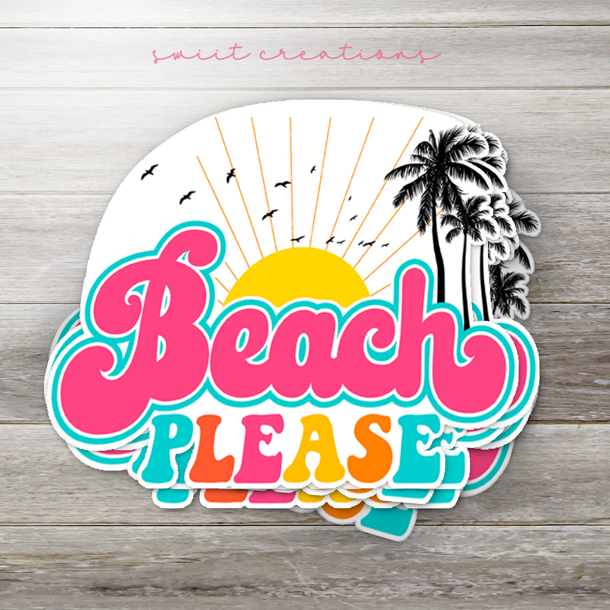 Stack of Beach Please glossy stickers on a gray wood table
