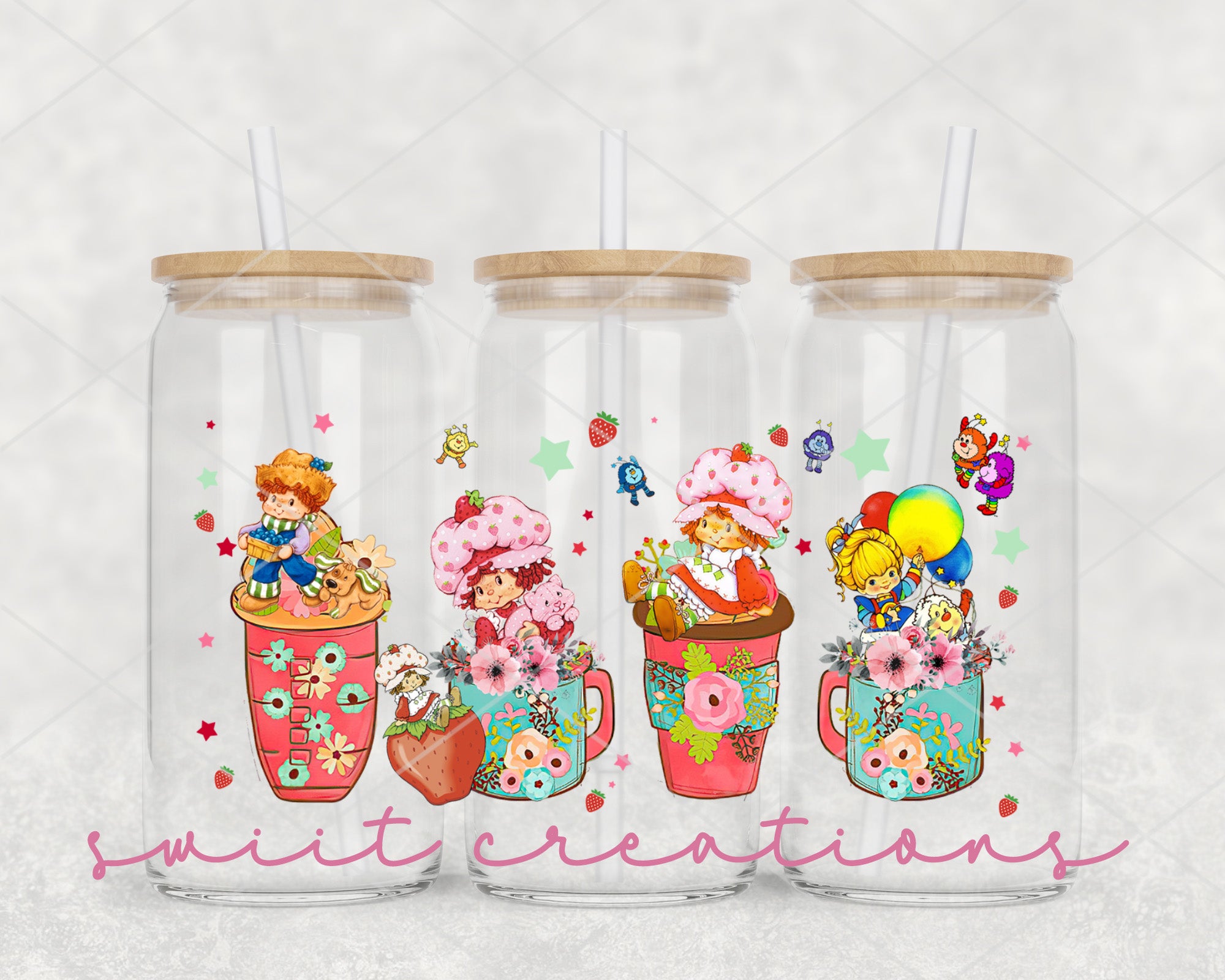 a set of three tumblers with cartoon characters on them