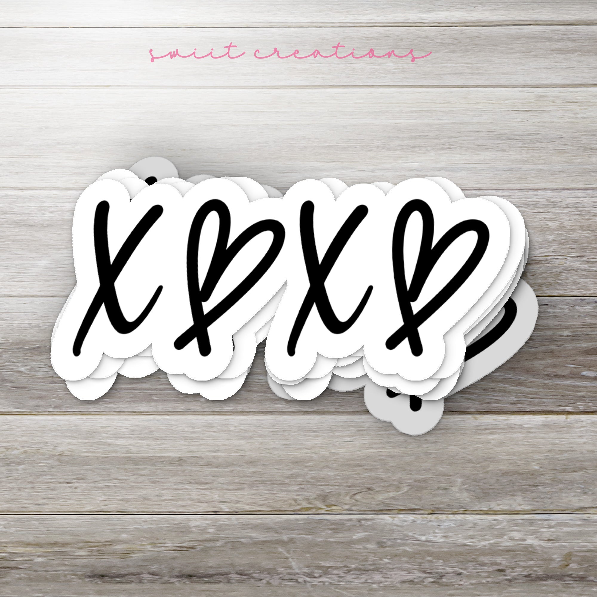 a close up of a paper cut out of the word xppxp