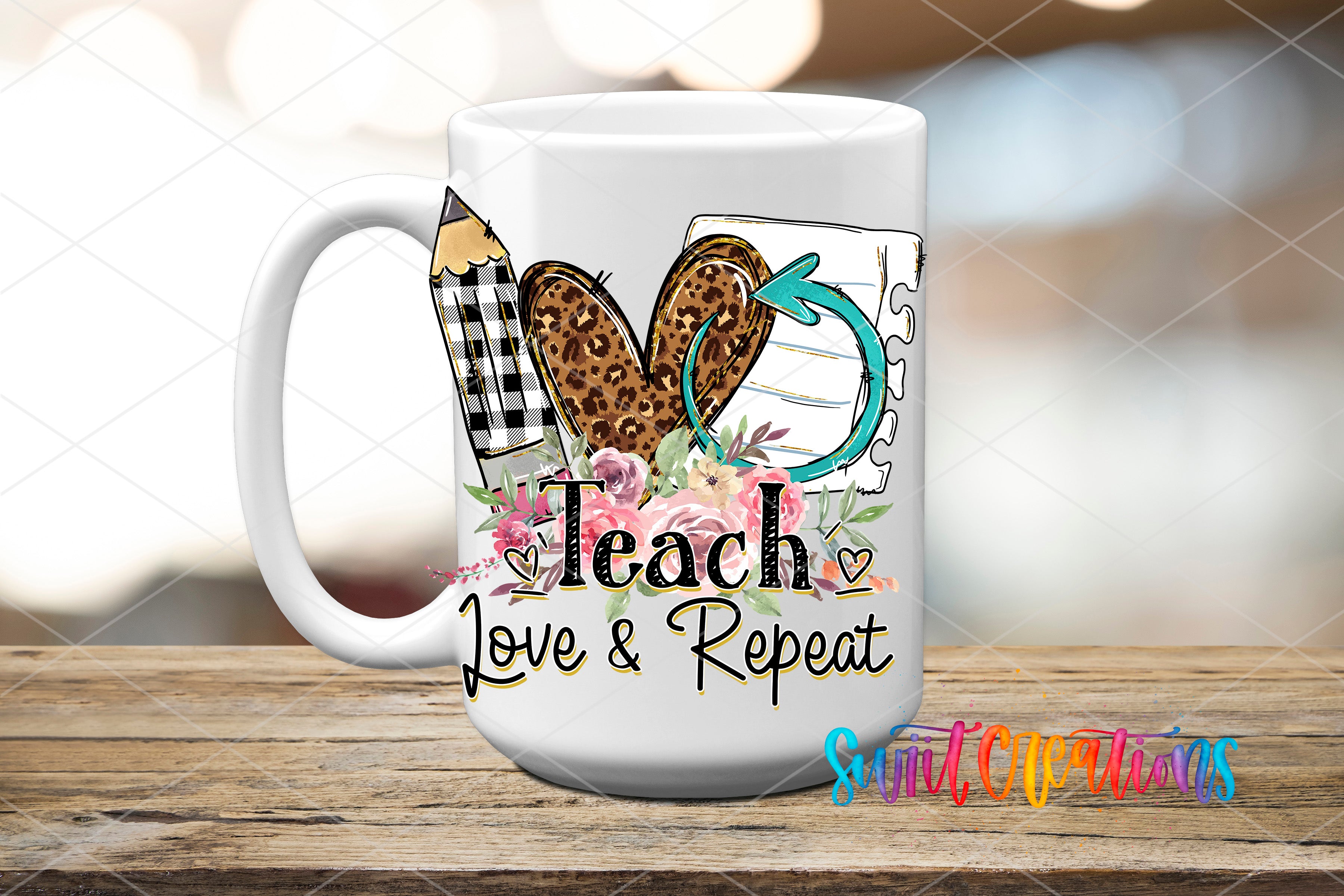A white ceramic mug with a colorful design featuring a pencil, heart, and flowers, along with the text "Teach Love & Repeat".