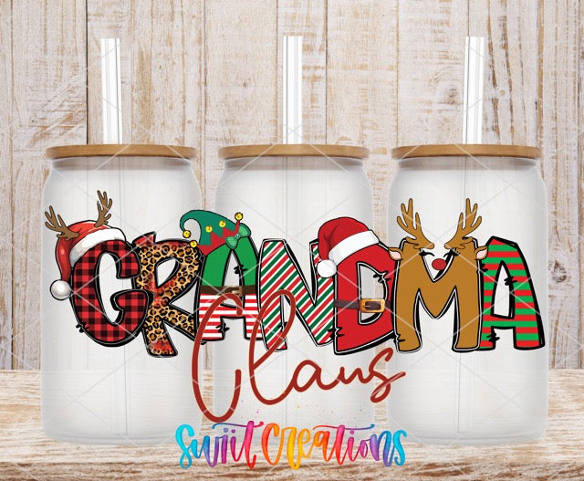 a couple of christmas mugs sitting on top of a wooden table