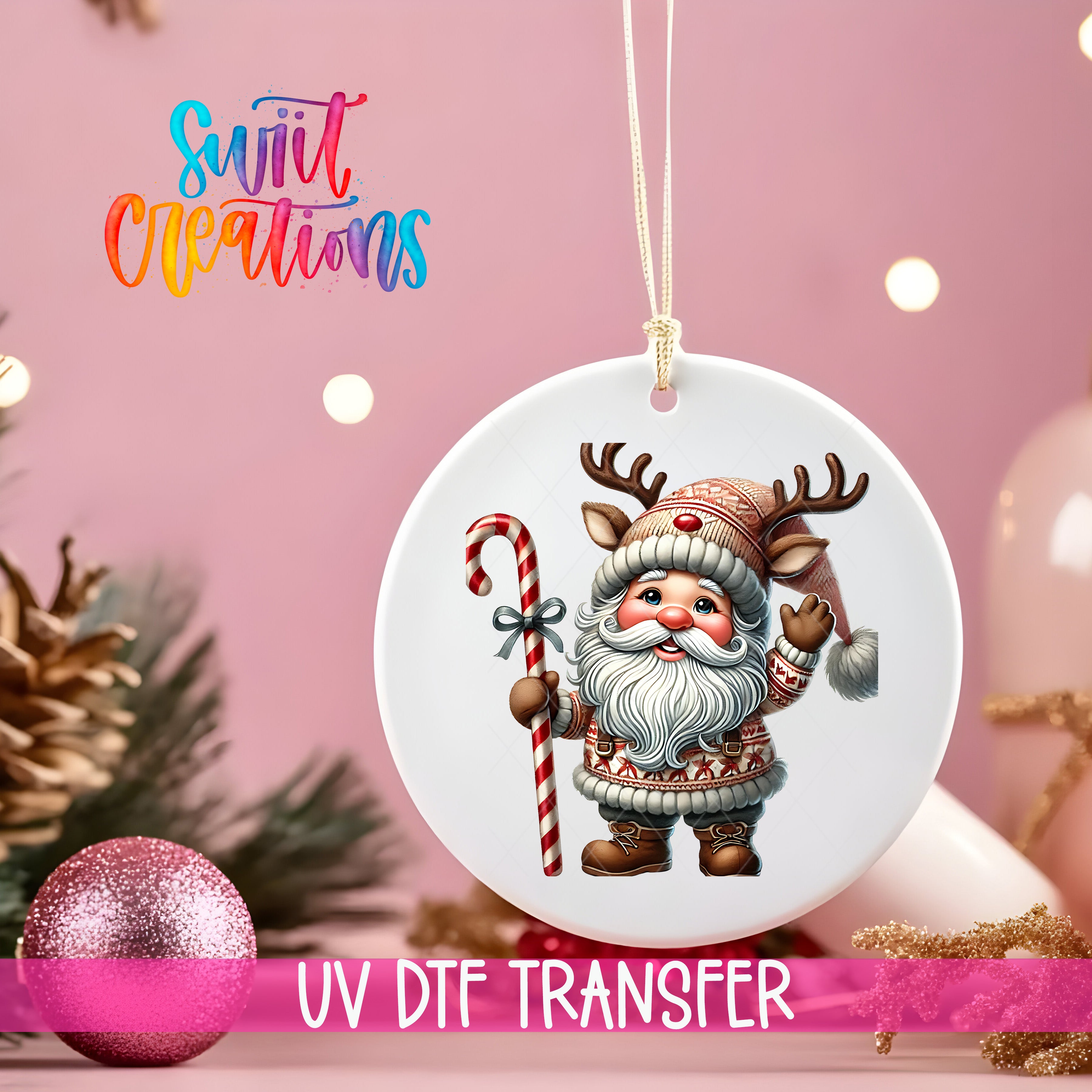 A white ornament featuring a cartoon Santa Claus holding a candy cane and waving, hanging on a string against a pink background with Christmas decorations in the background.