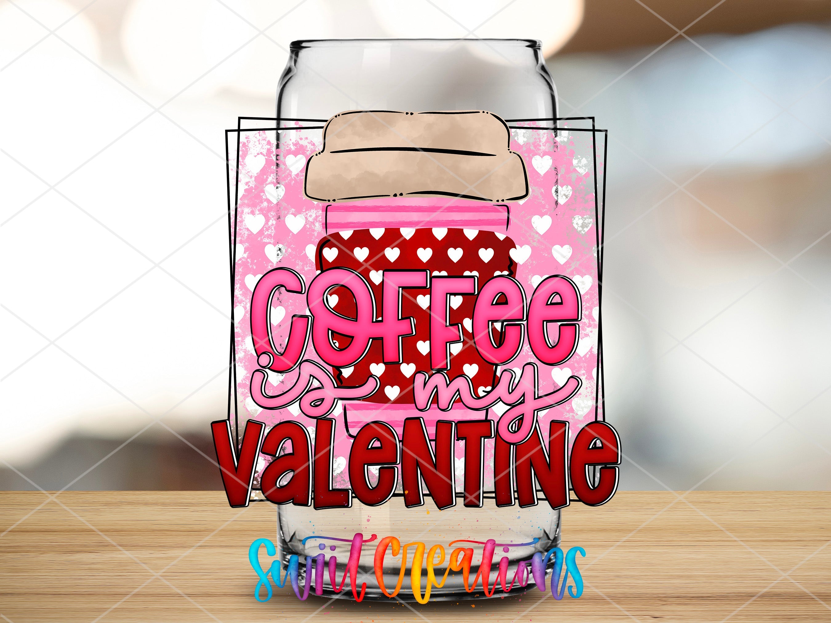 a glass jar filled with coffee and valentine's day treats