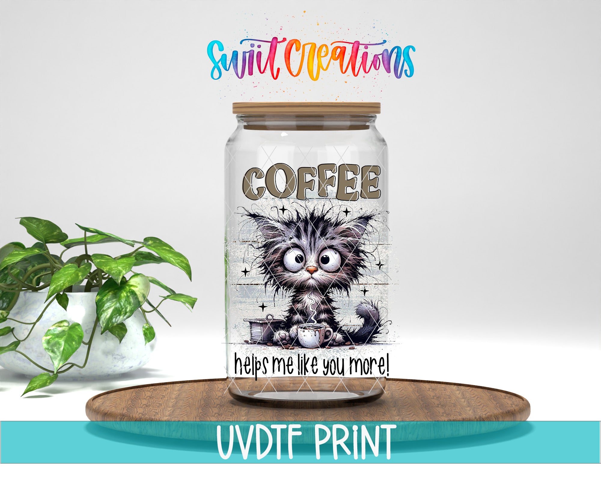 A glass jar with a cat design and the word "COFFEE" printed on it, placed on a wooden surface.