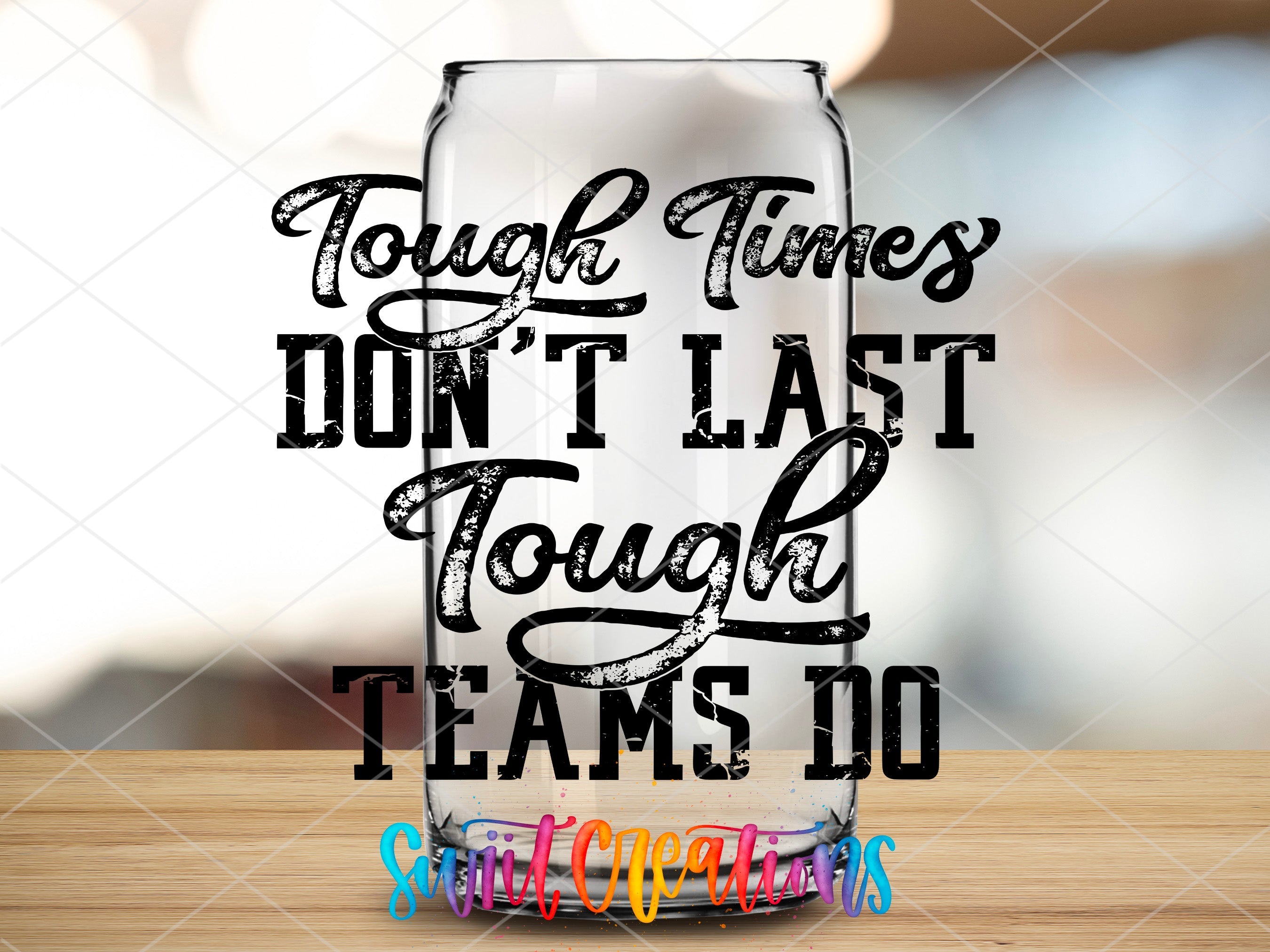a glass with the words tough times don't last tough teams do