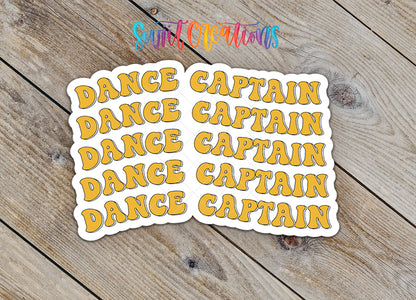 a sticker with the word "DANCE" repeated multiple times in a playful, artistic style.