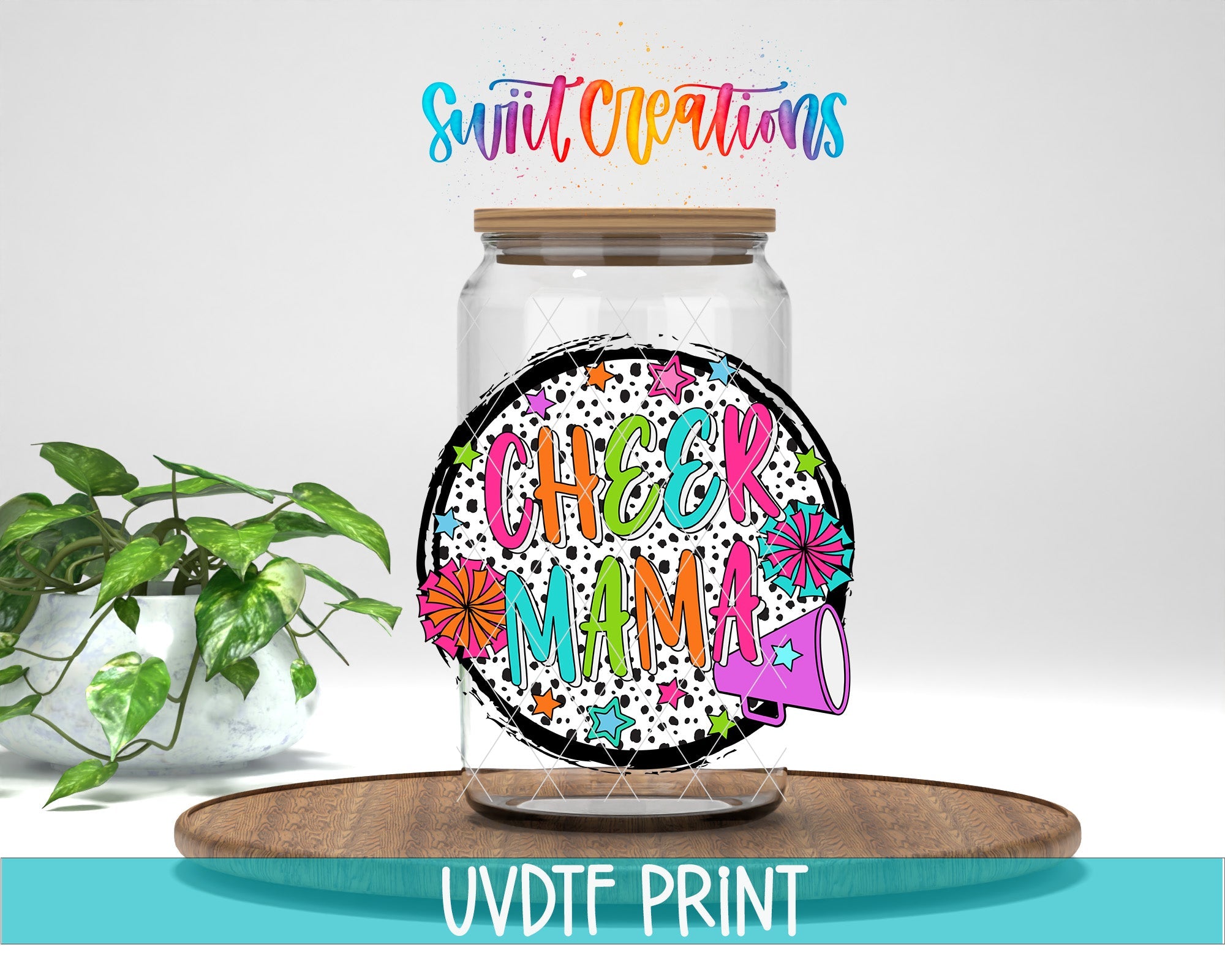 a glass jar with a colorful design on top of it