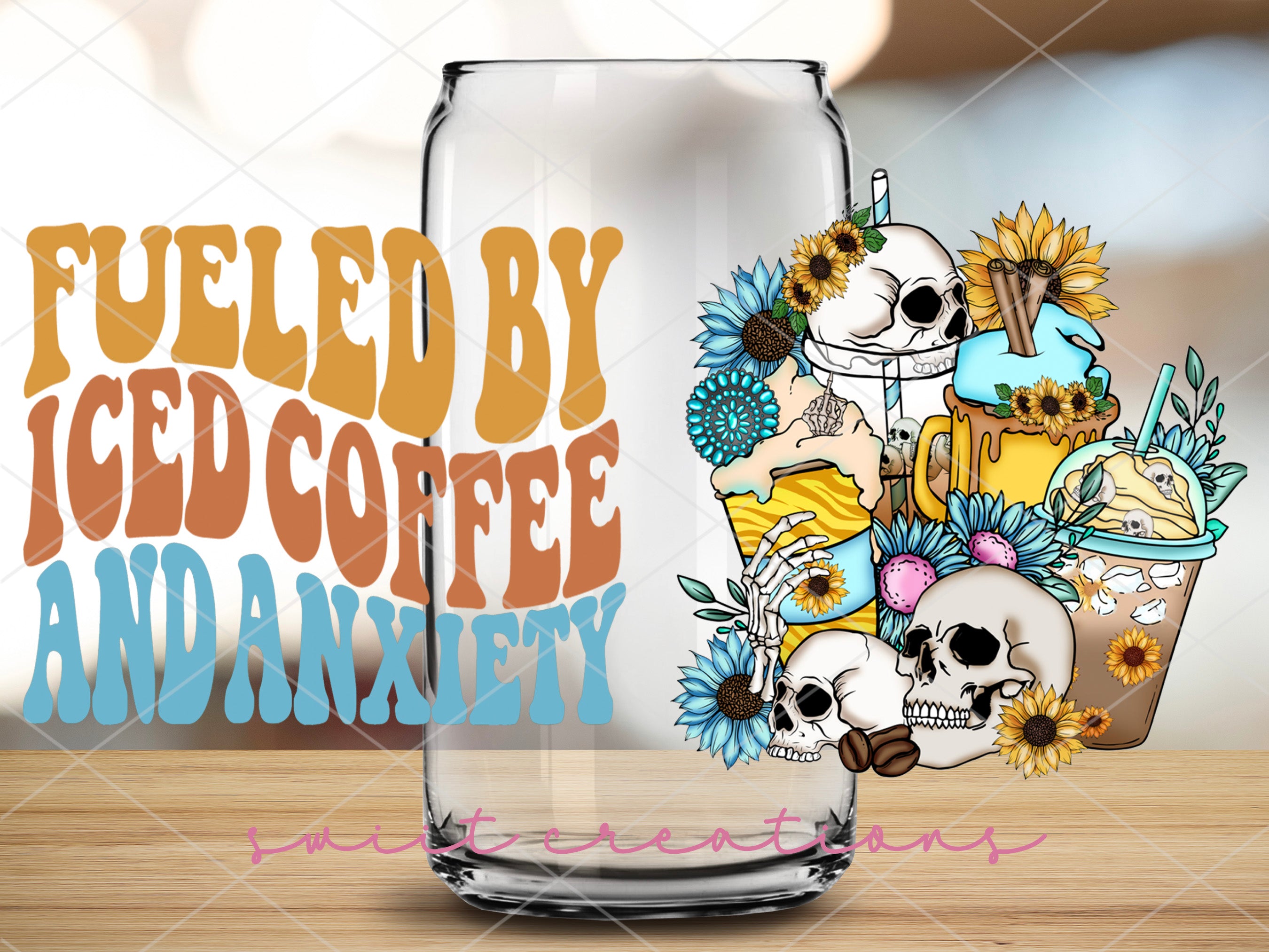 a glass of iced coffee with skulls and flowers